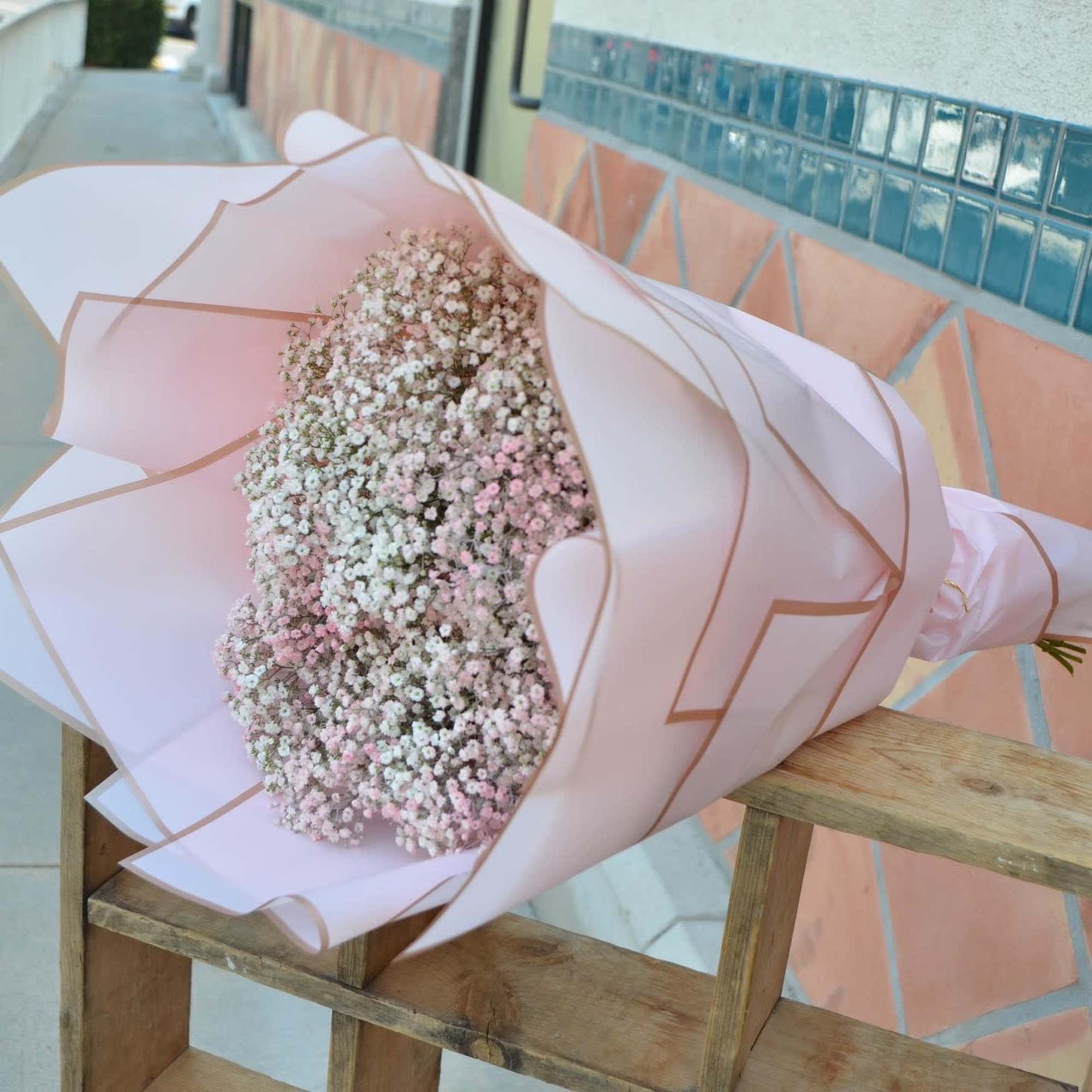 A large bouquet of pink baby breath perfect for a baby shower, photo 2 of 3