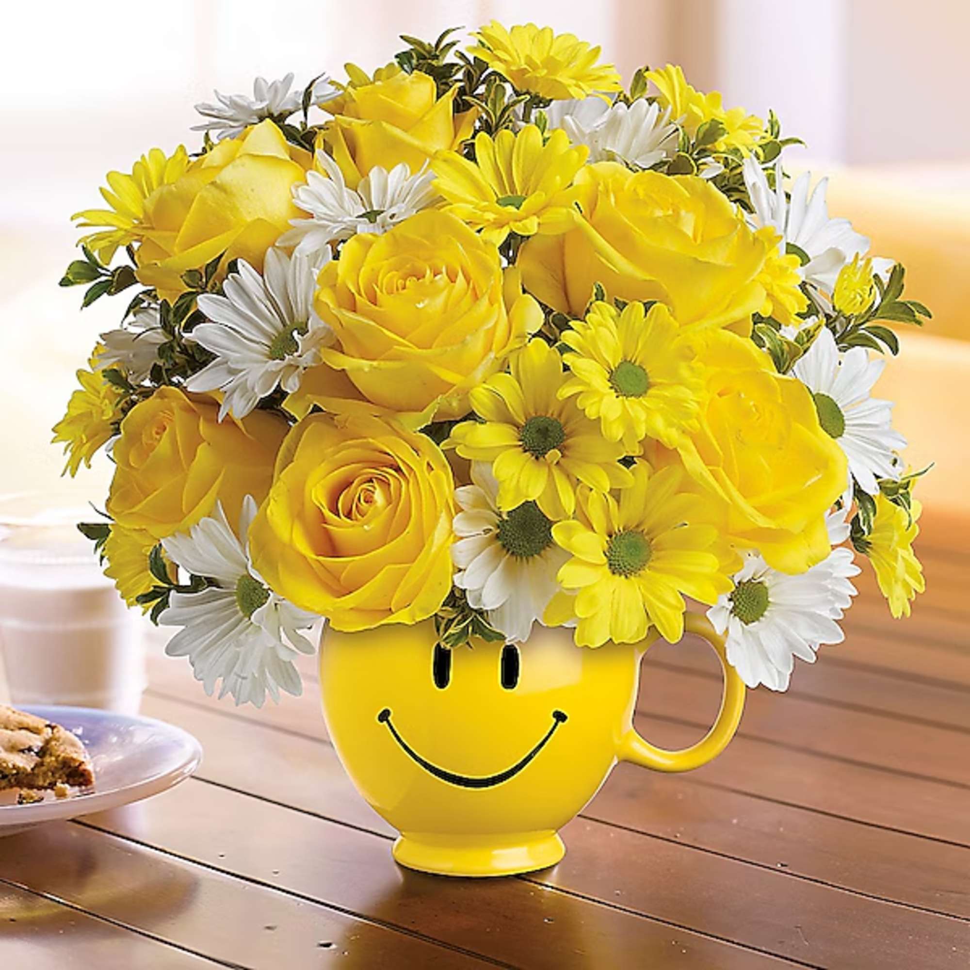 Yellow roses and white daisies in a smiley-face mug, photo 2 of 2