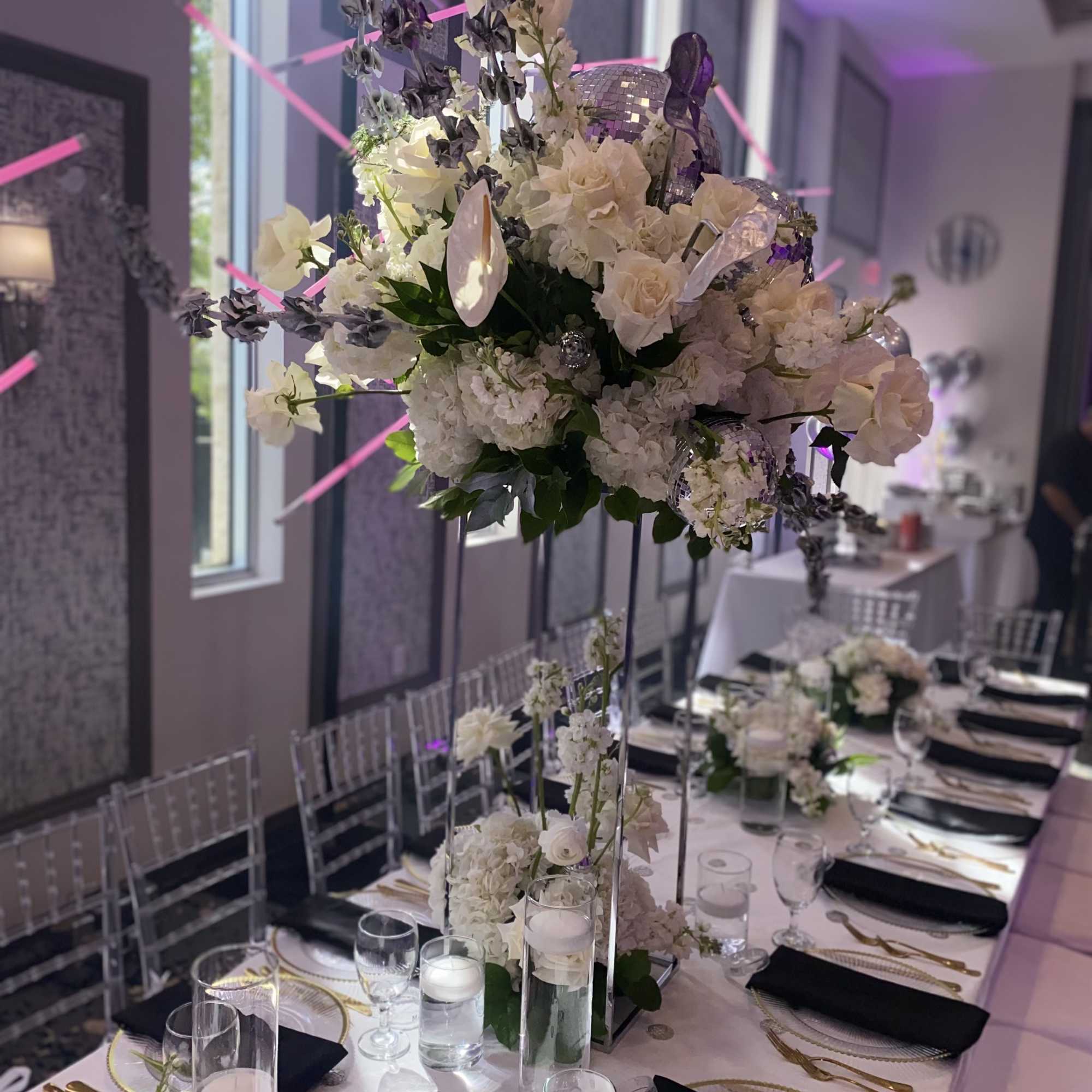 Decoration with variety of white flowers and disco balls. Arrangements of different, photo 2 of 2