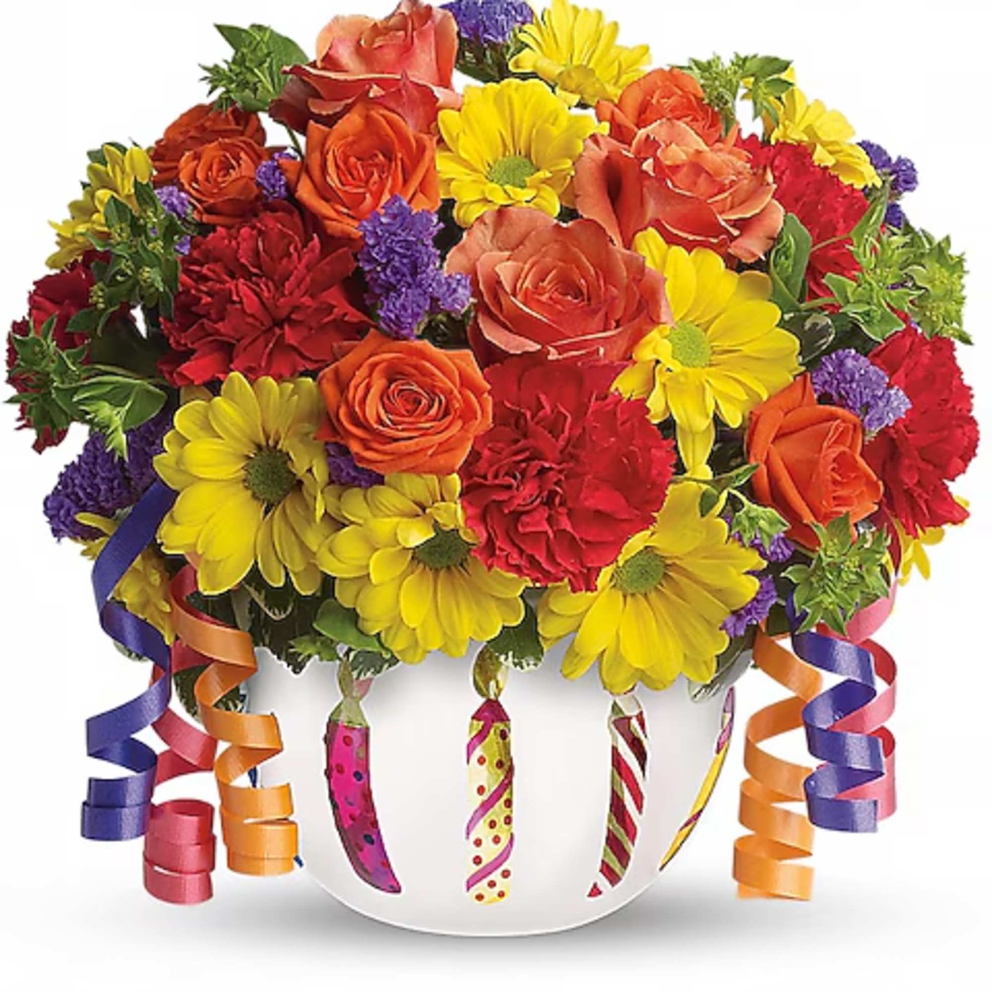 Colorful bouquet of roses, daisies, and carnations in a white vase with curling ribbons