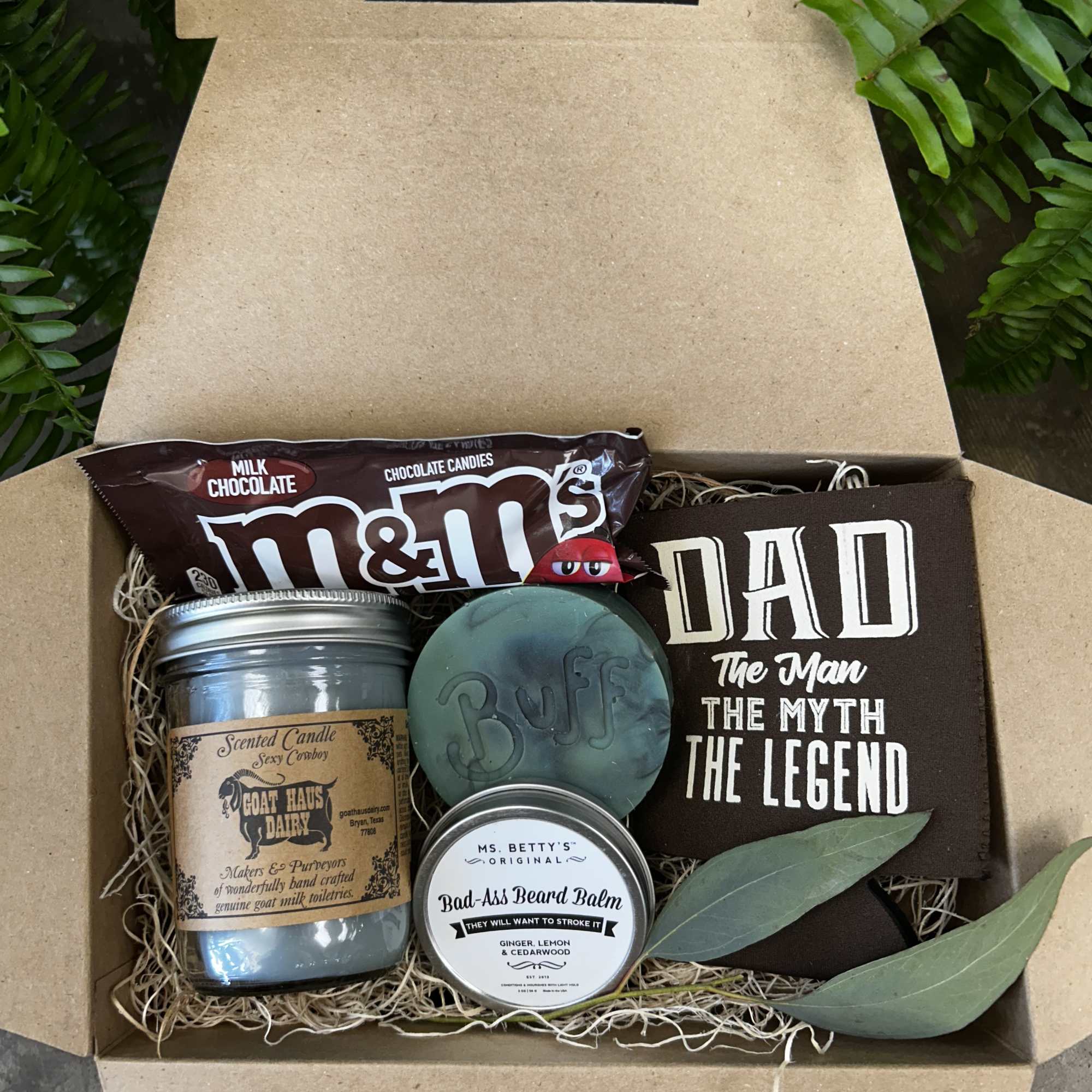 Gift box with candy, candle, beard balm, and a dad-themed card