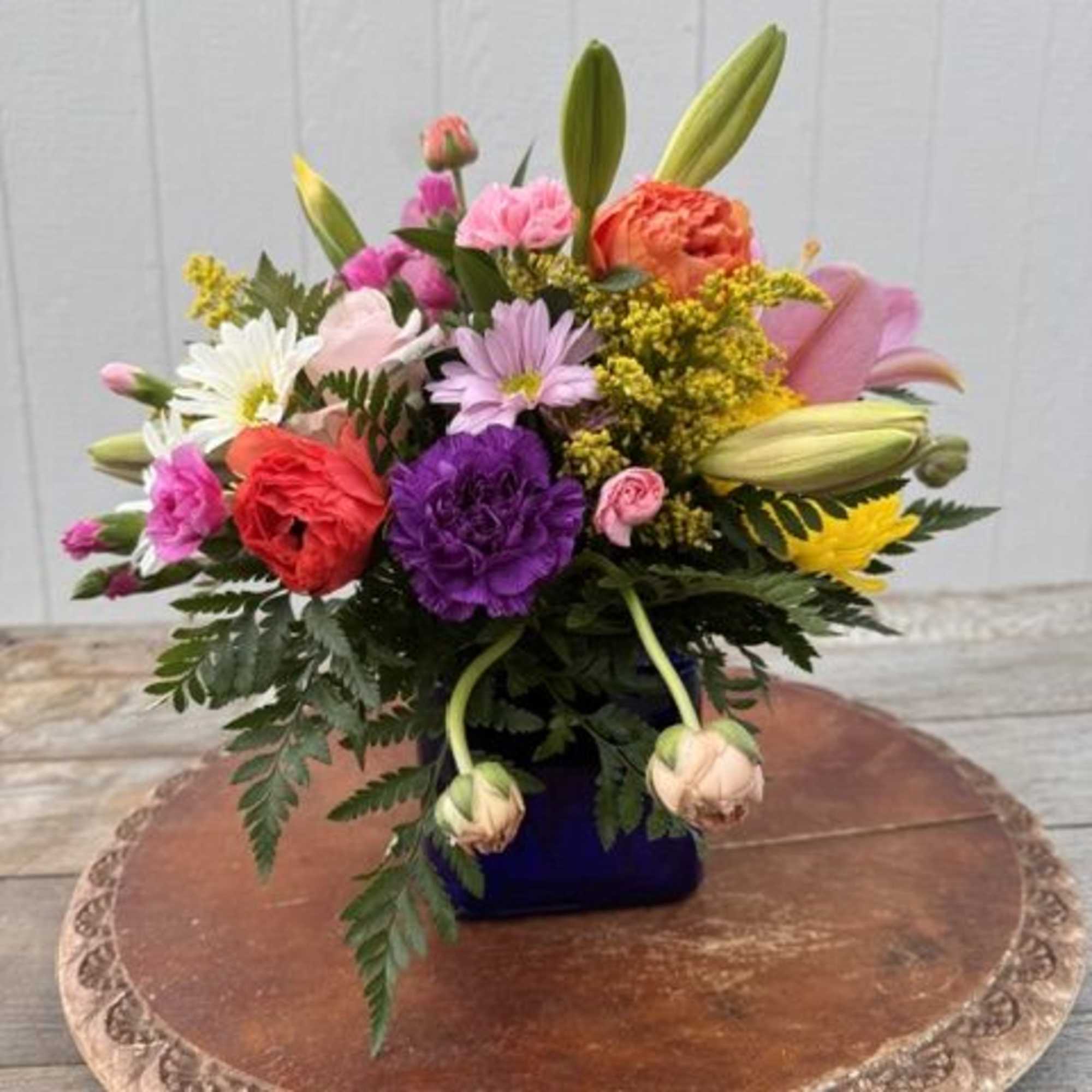 Mama Mia &ndash; Colorful Mixed Flower Arrangement in a Cube Vase

Bright, bold