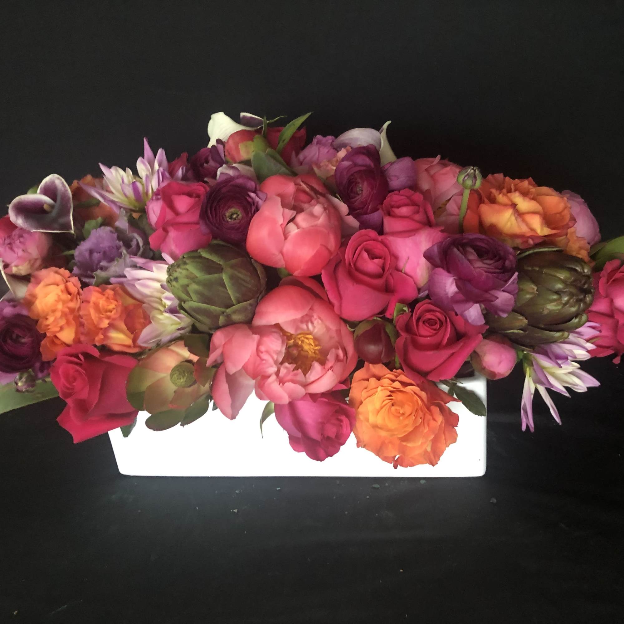 This amazing full full low lush centerpiece/gift is sure to say it