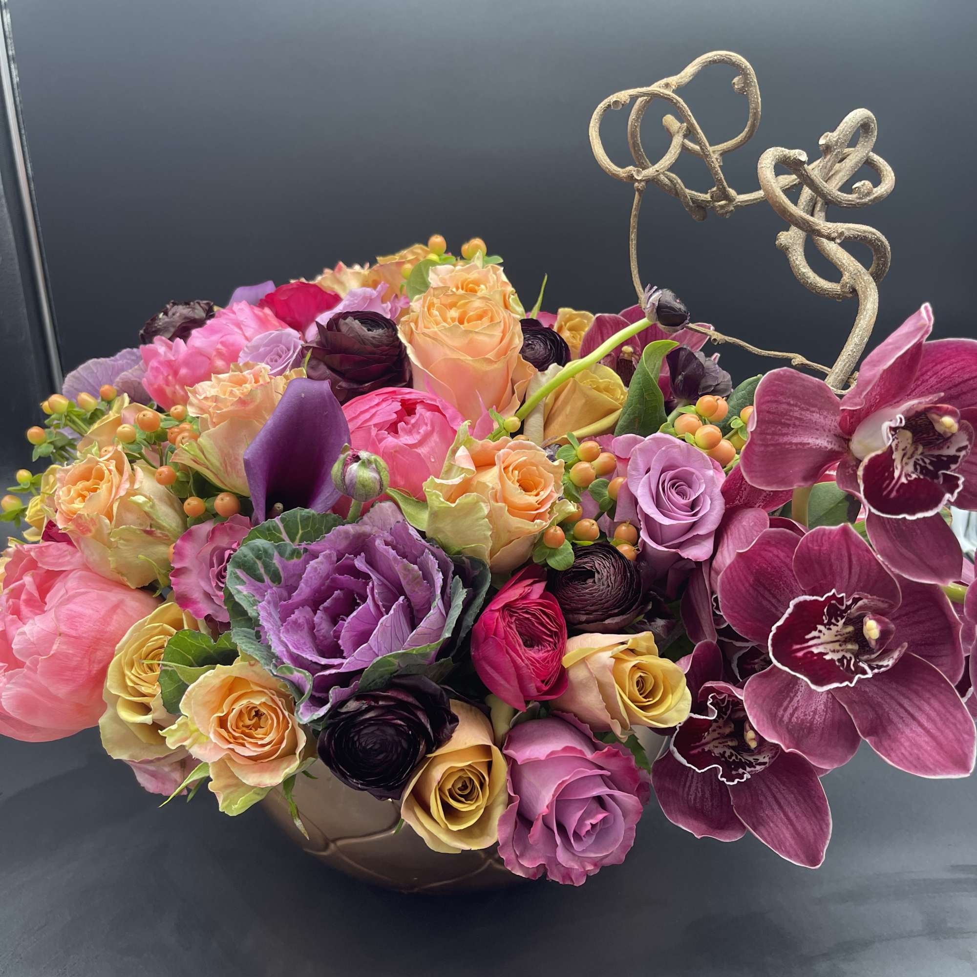 Garden style roses, scabiosa, ranunculus, proteas just to name a few. This, photo 3 of 4