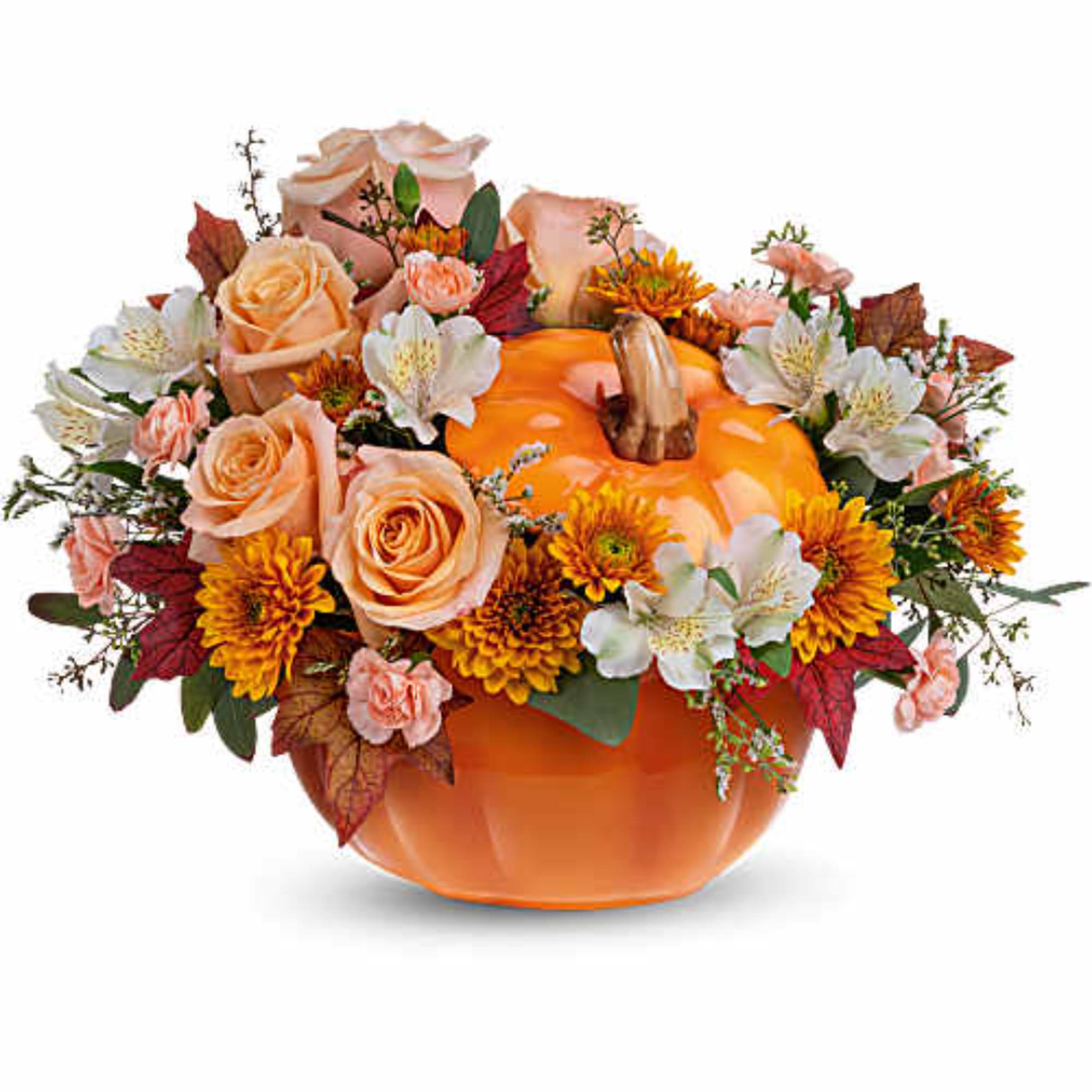 Pumpkin-shaped vase with peach roses and autumn flowers