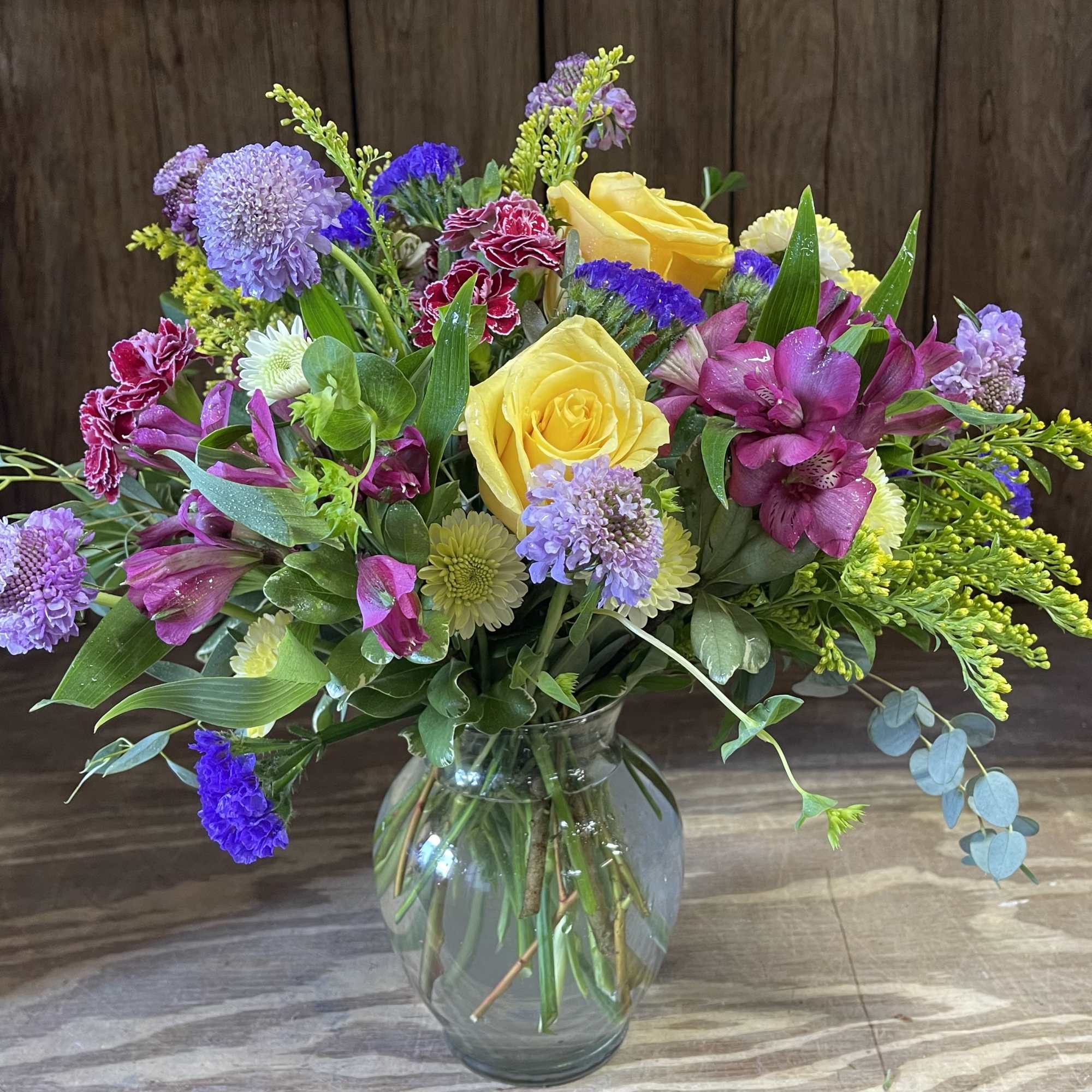 Bright and Cheerful and flowers all around! What a lovely display of