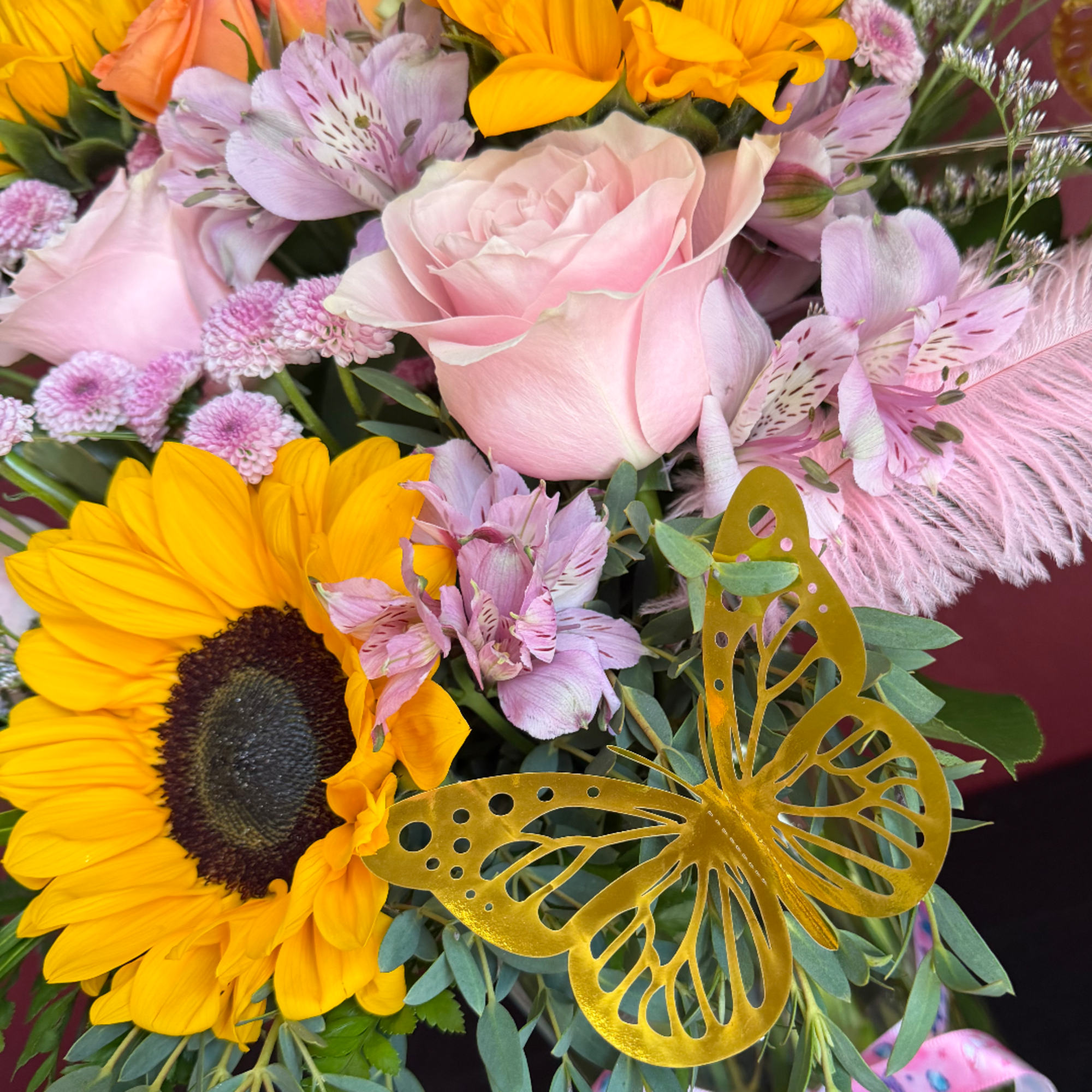 Bouquet with pink roses, sunflowers, and lavender alstroemeria