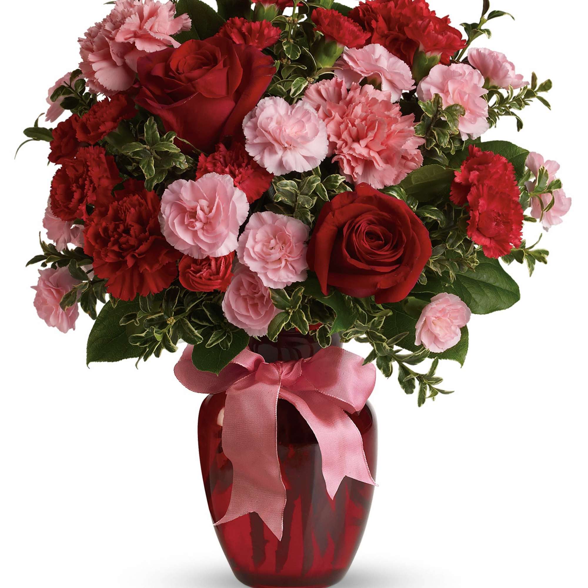 Red roses and pink carnations in a red vase with a pink ribbon