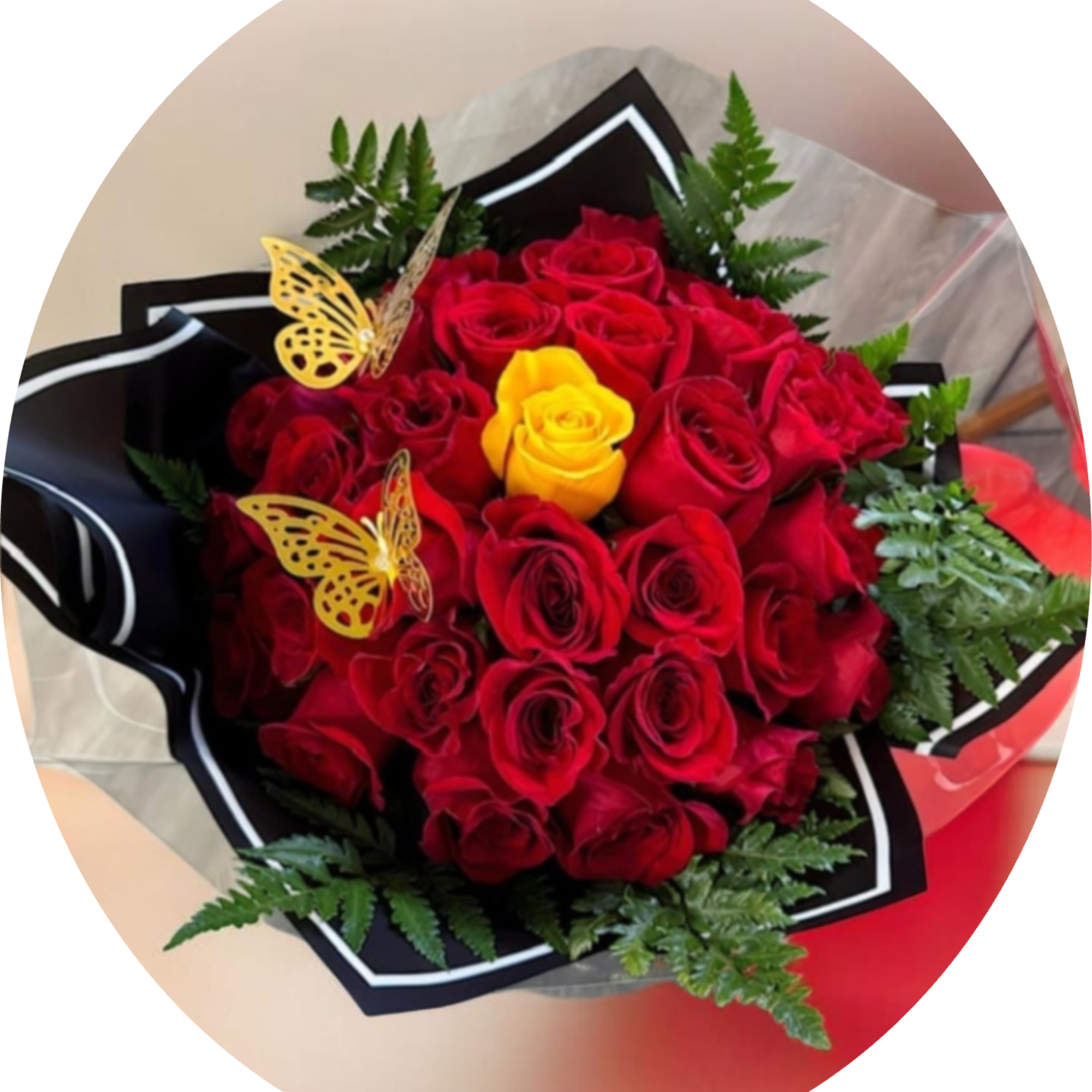 A dense cloud of red roses punctuated by a single bright yellow