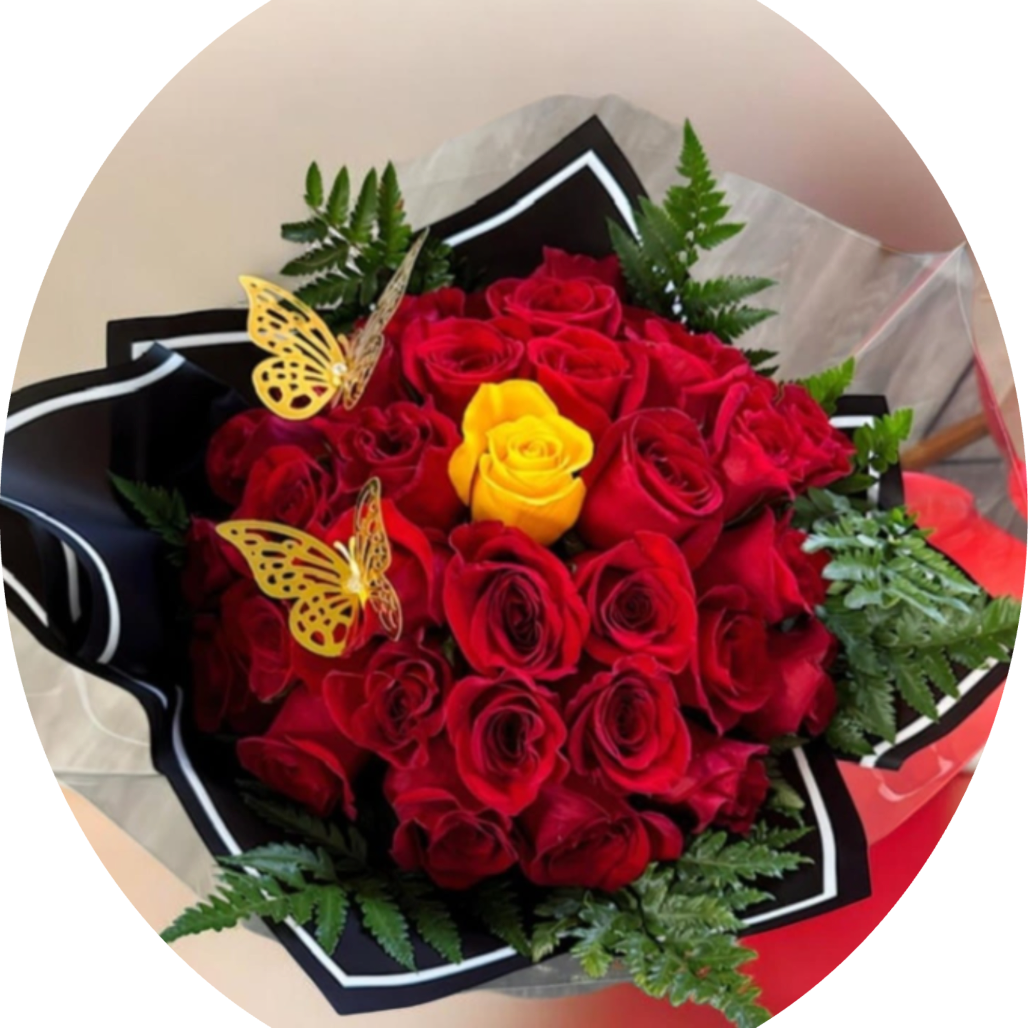 A dense cloud of red roses punctuated by a single bright yellow