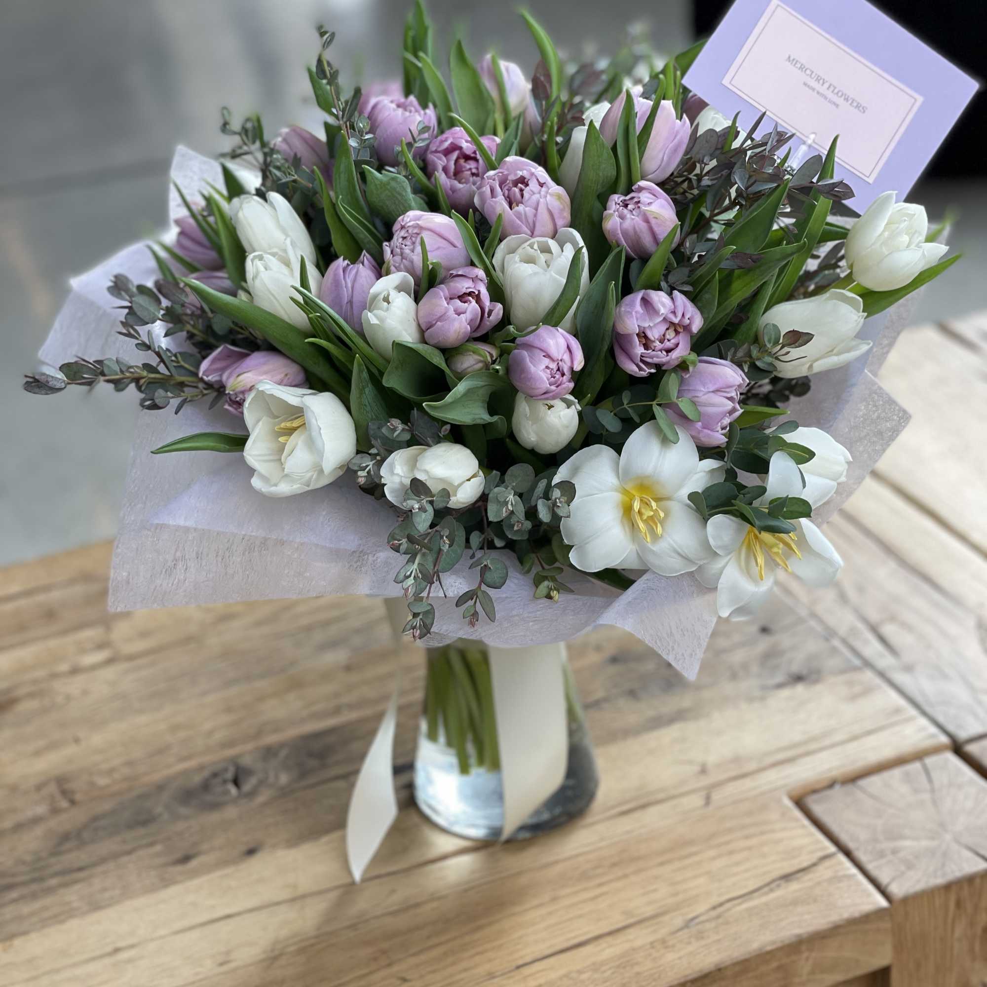 Bouquet of pink and white tulips in a glass vase, photo 7 of 7