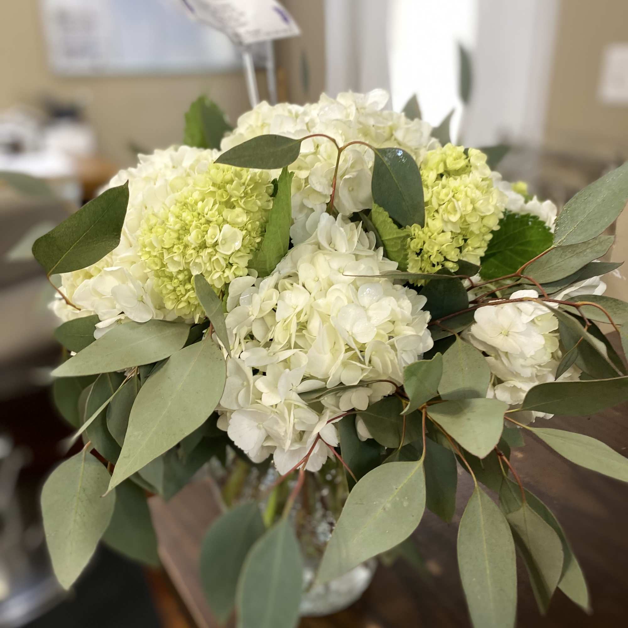 White hydrangea bouquet with eucalyptus greenery