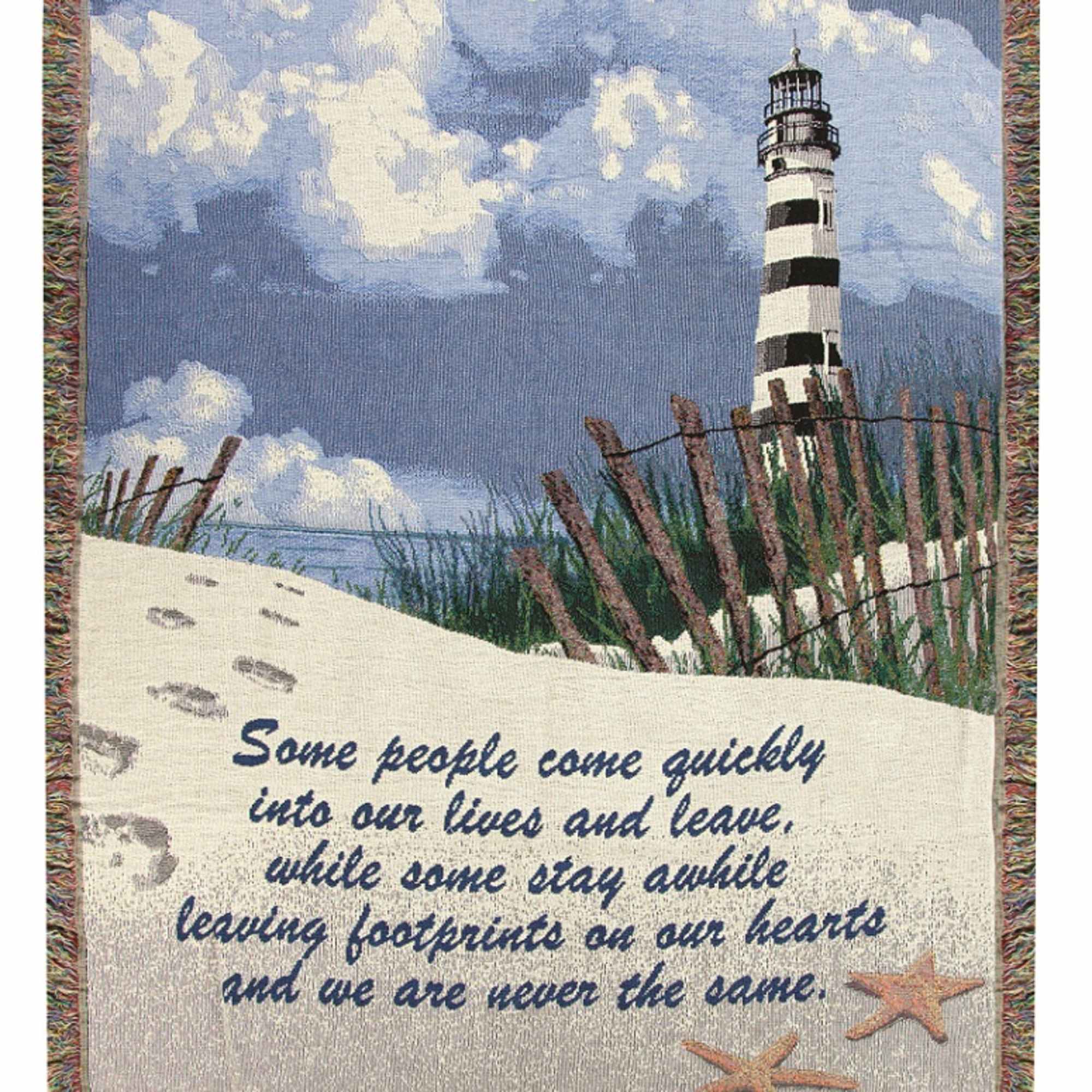 Woven blanket with a lighthouse scene and memorial quote