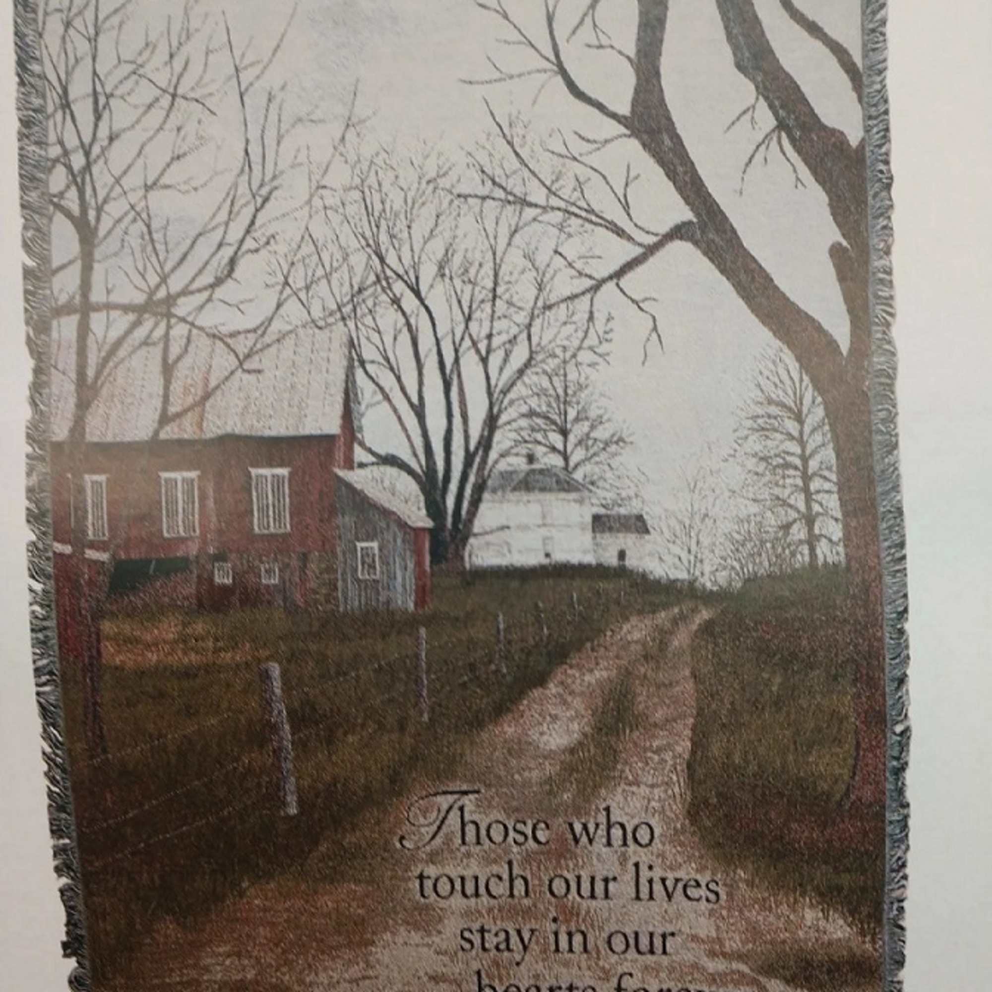Fringed memorial throw with a farmhouse scene and sympathy quote