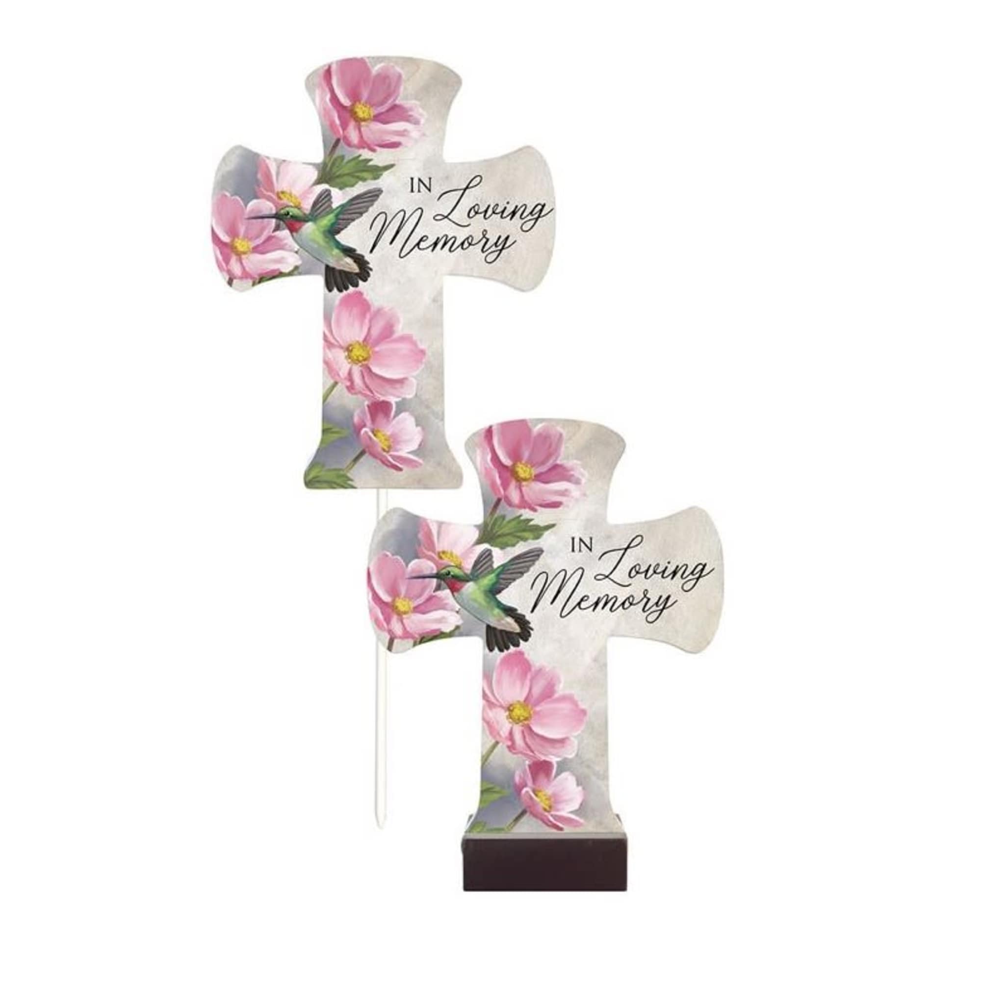 Two cross-shaped memorial plaques with pink flowers and hummingbirds
