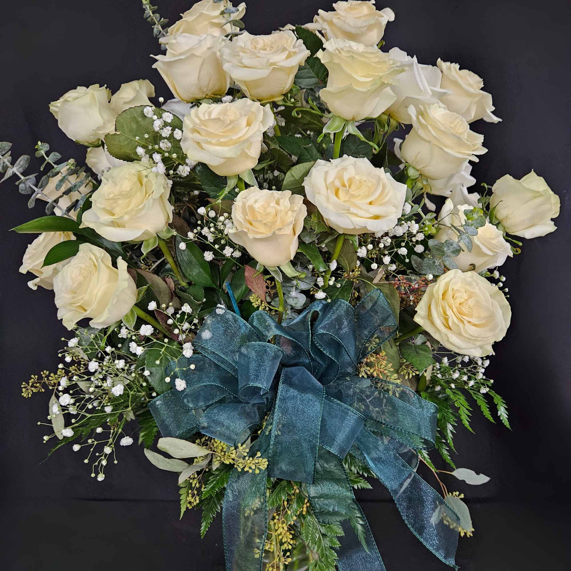A dozen white roses are a classic gift! Perfect for Valentine's Day