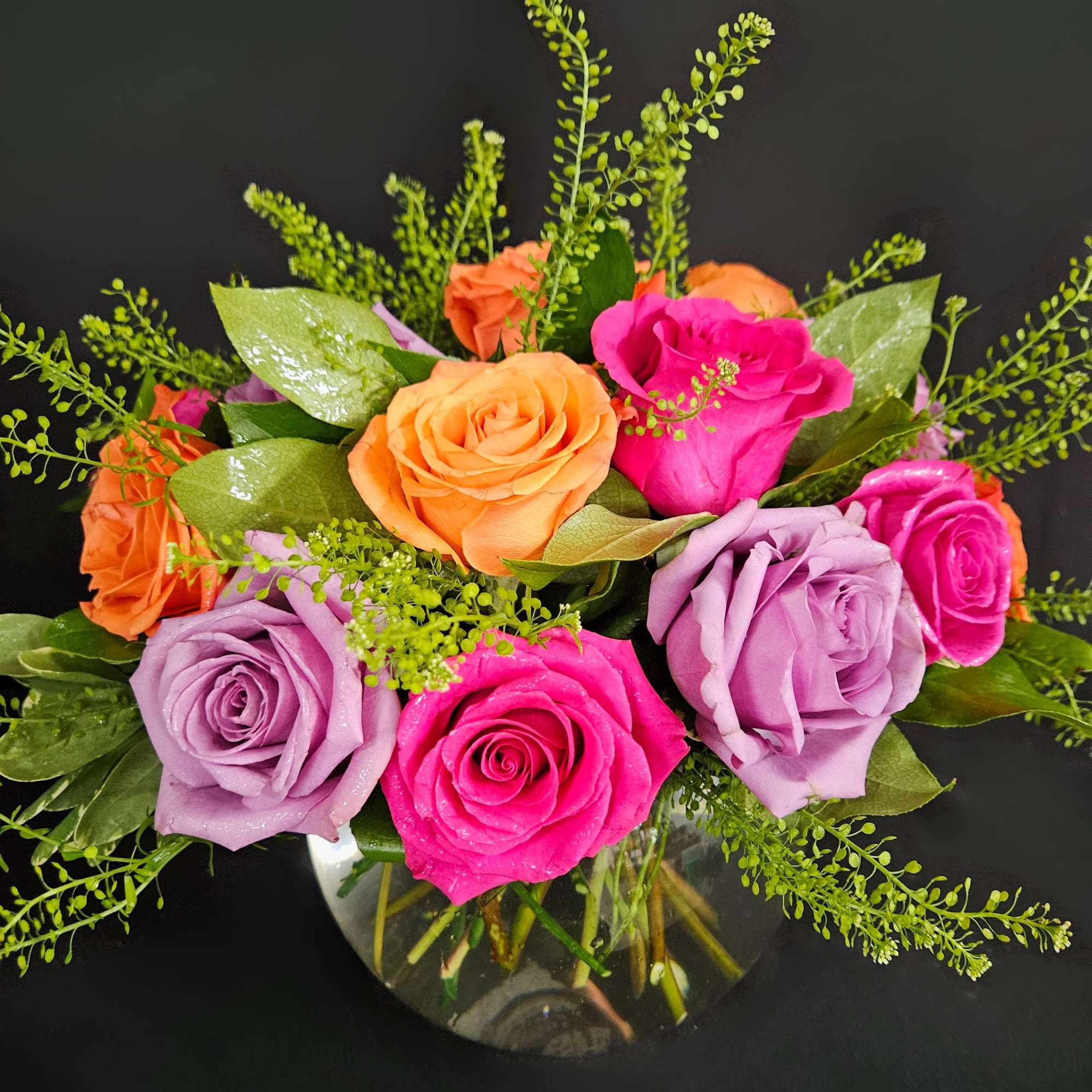 A lovely bowl of colorful roses brightens and lifts any room (and
