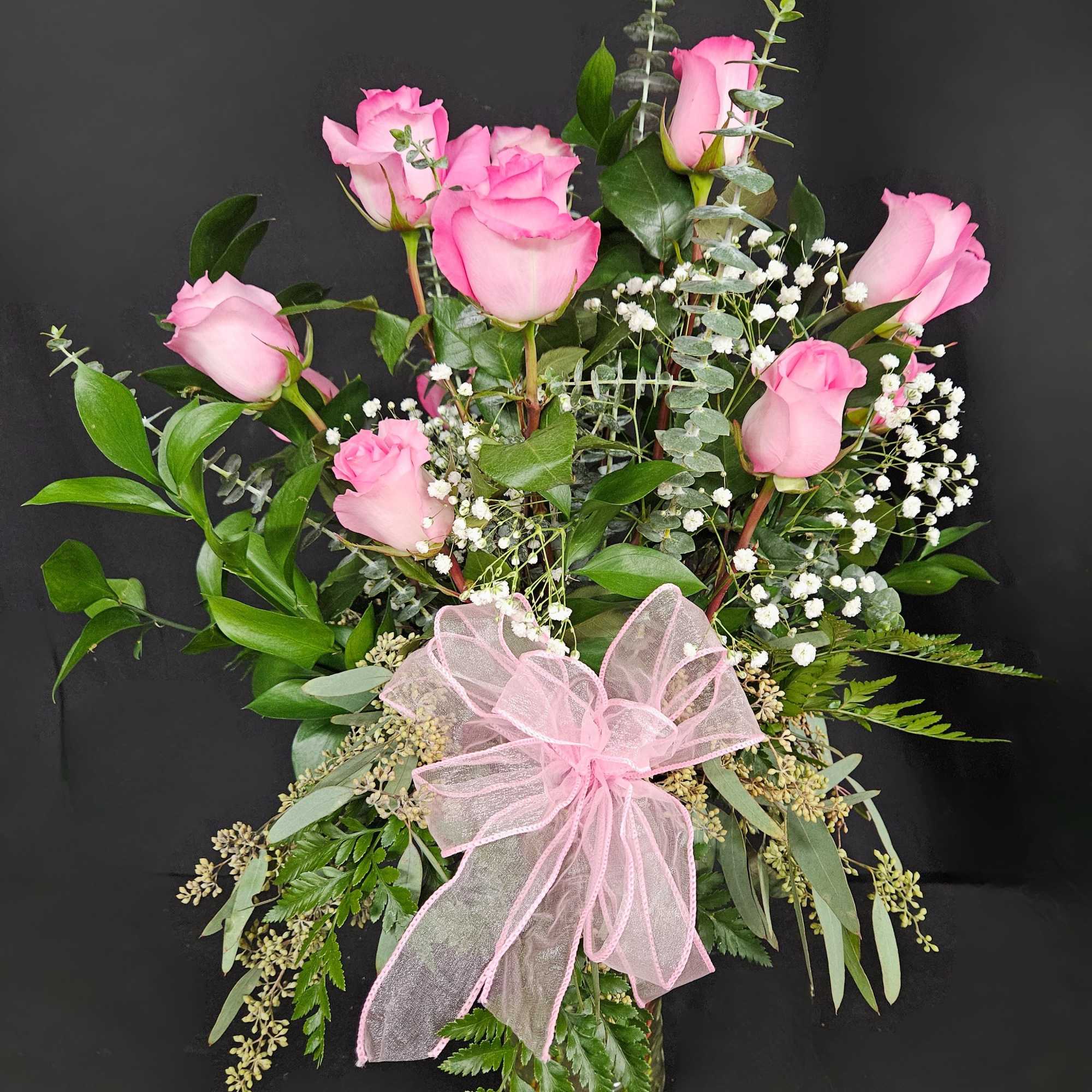 These pink roses are cheerful and fun! Dozen Long Stemmed Pink Roses