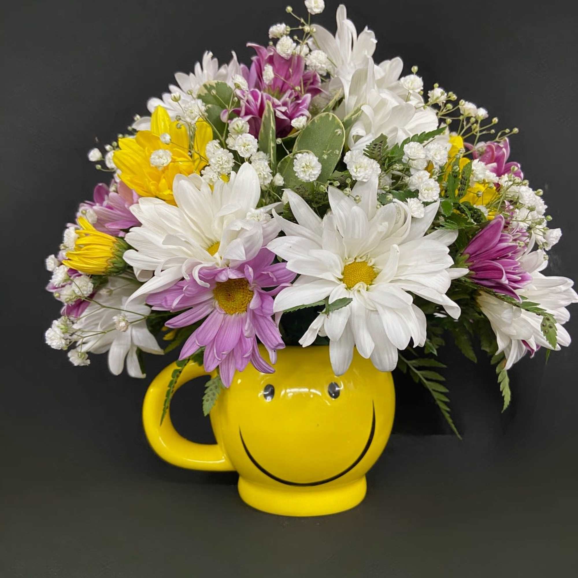 Celebrate the birth of a new baby with this adorable smiley mug