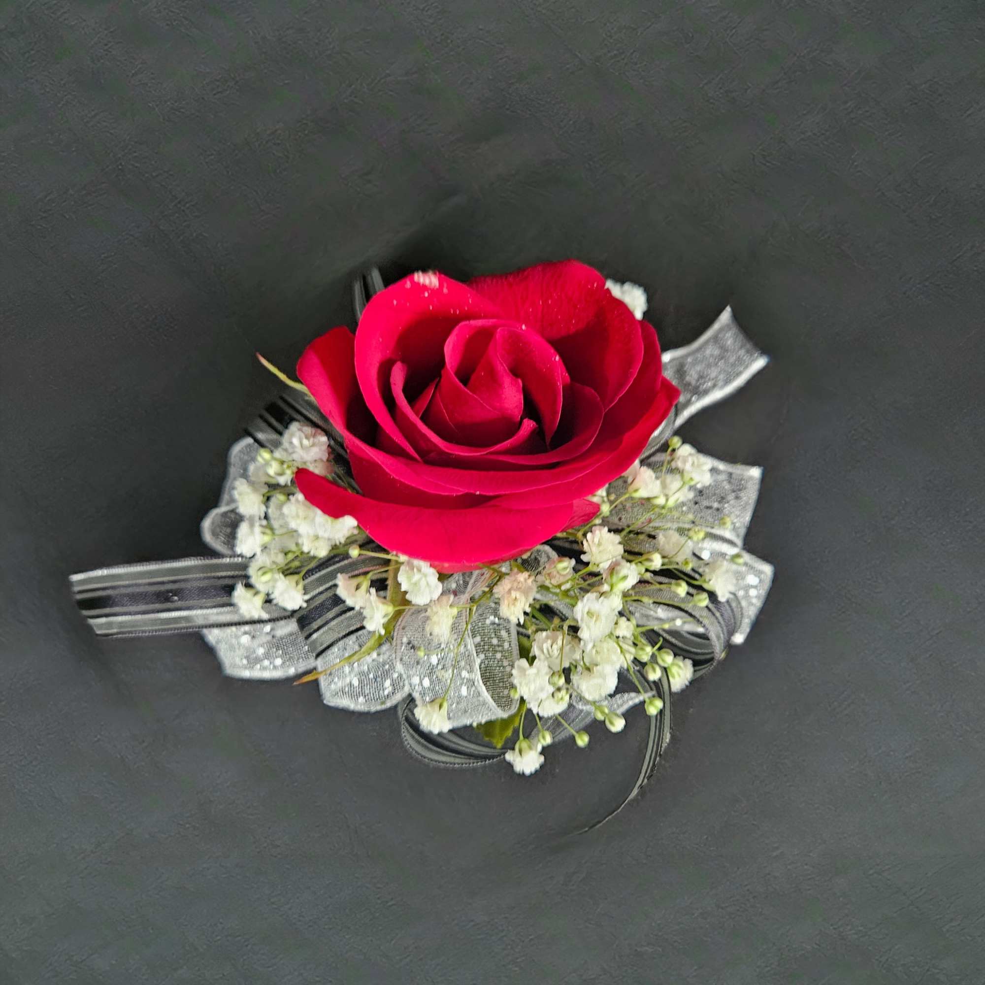 A beautiful rose corsage that will compliment any outfit. Please select the, photo 2 of 2