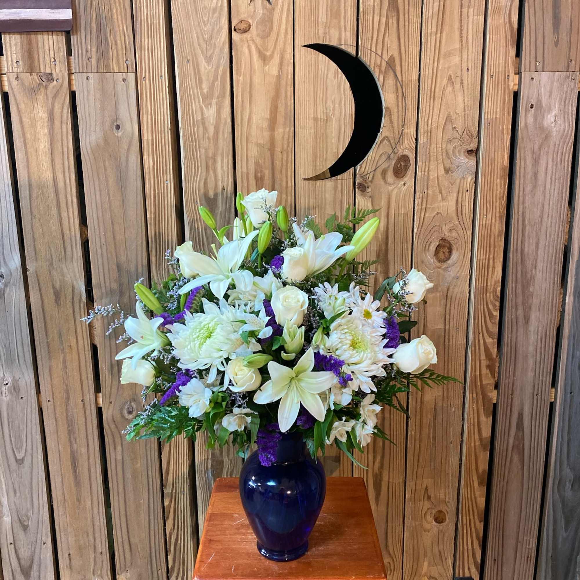 cr&egrave;me roses, graceful white oriental lilies, white alstroemeria, a white disbud mum