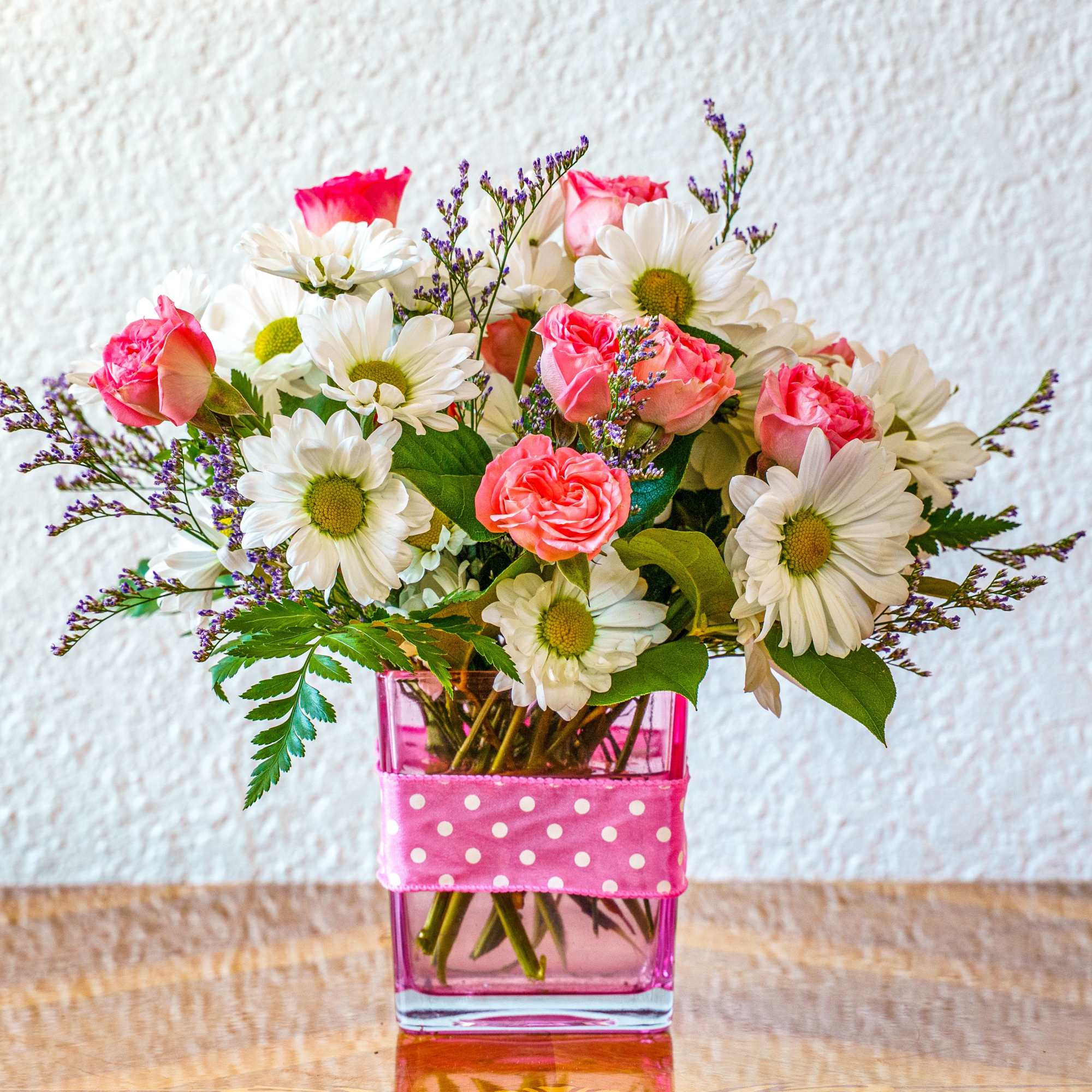 Dazzle the little doll in your world! This pretty little arrangement is