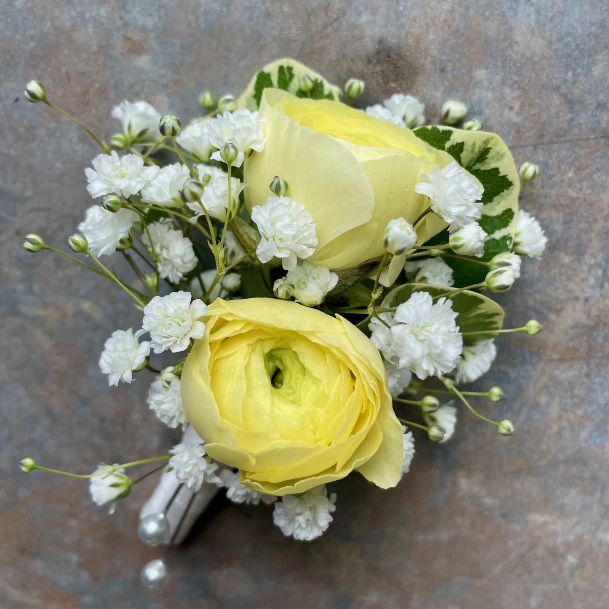 Boutonniere featuring a ranunculus with accent flowers and foliage. We can customize, photo 3 of 3