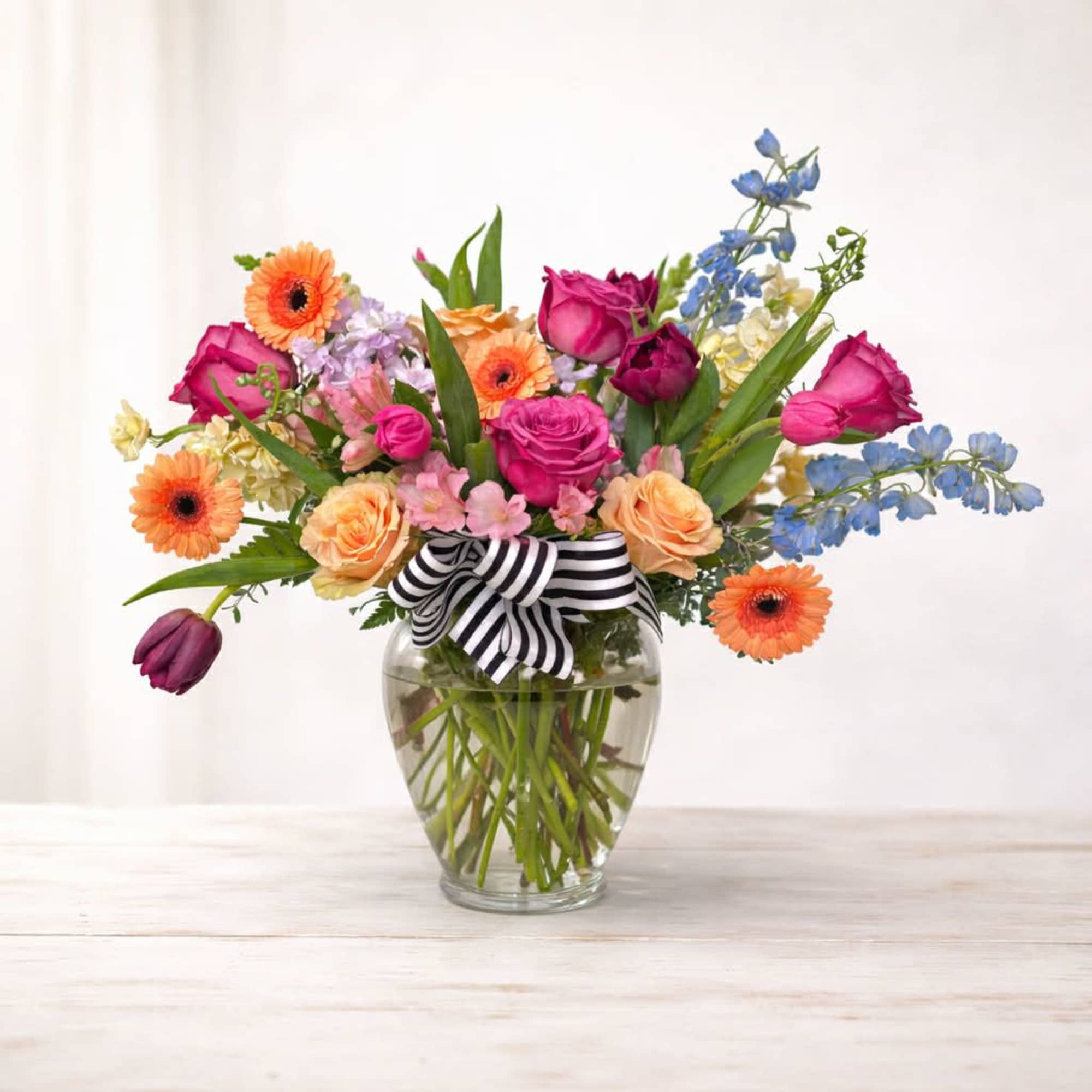 Bright, cheerful, and full of personality &mdash; our Garden Party Blooms arrangement