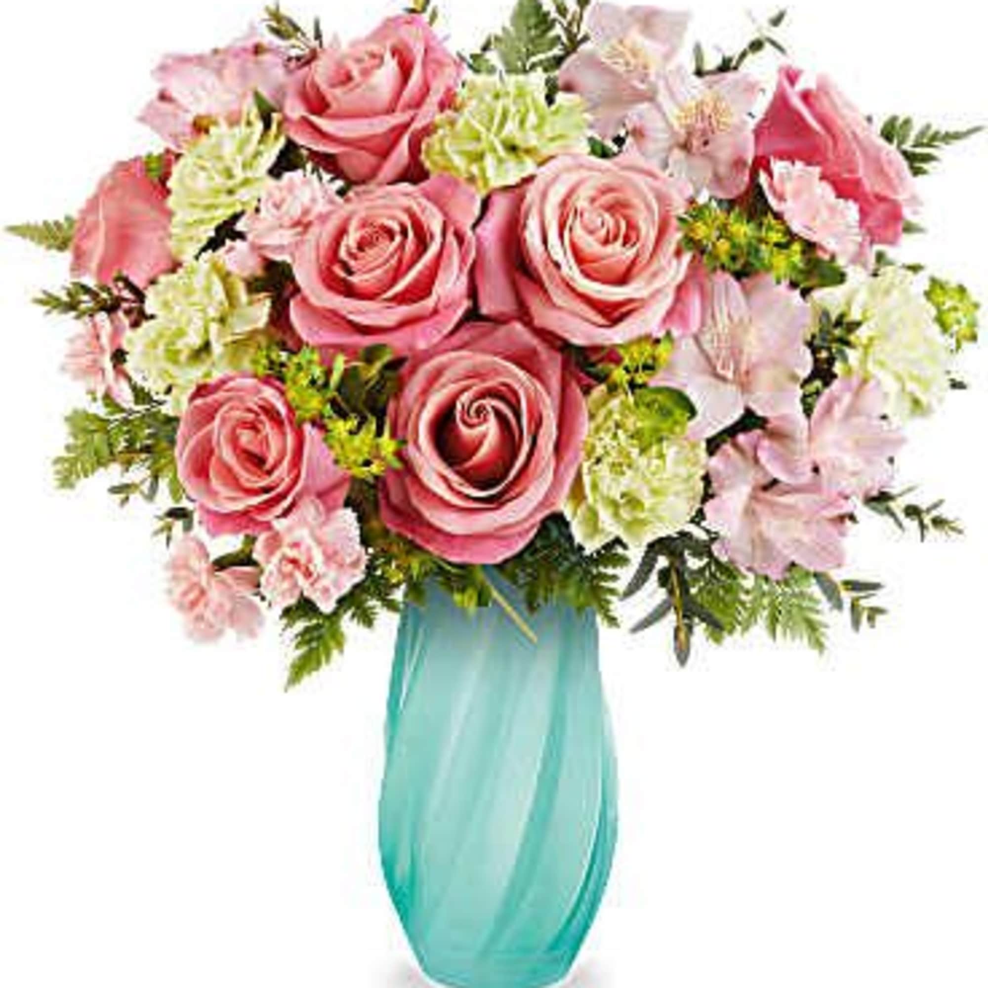 Pink roses and pale flowers in a turquoise vase