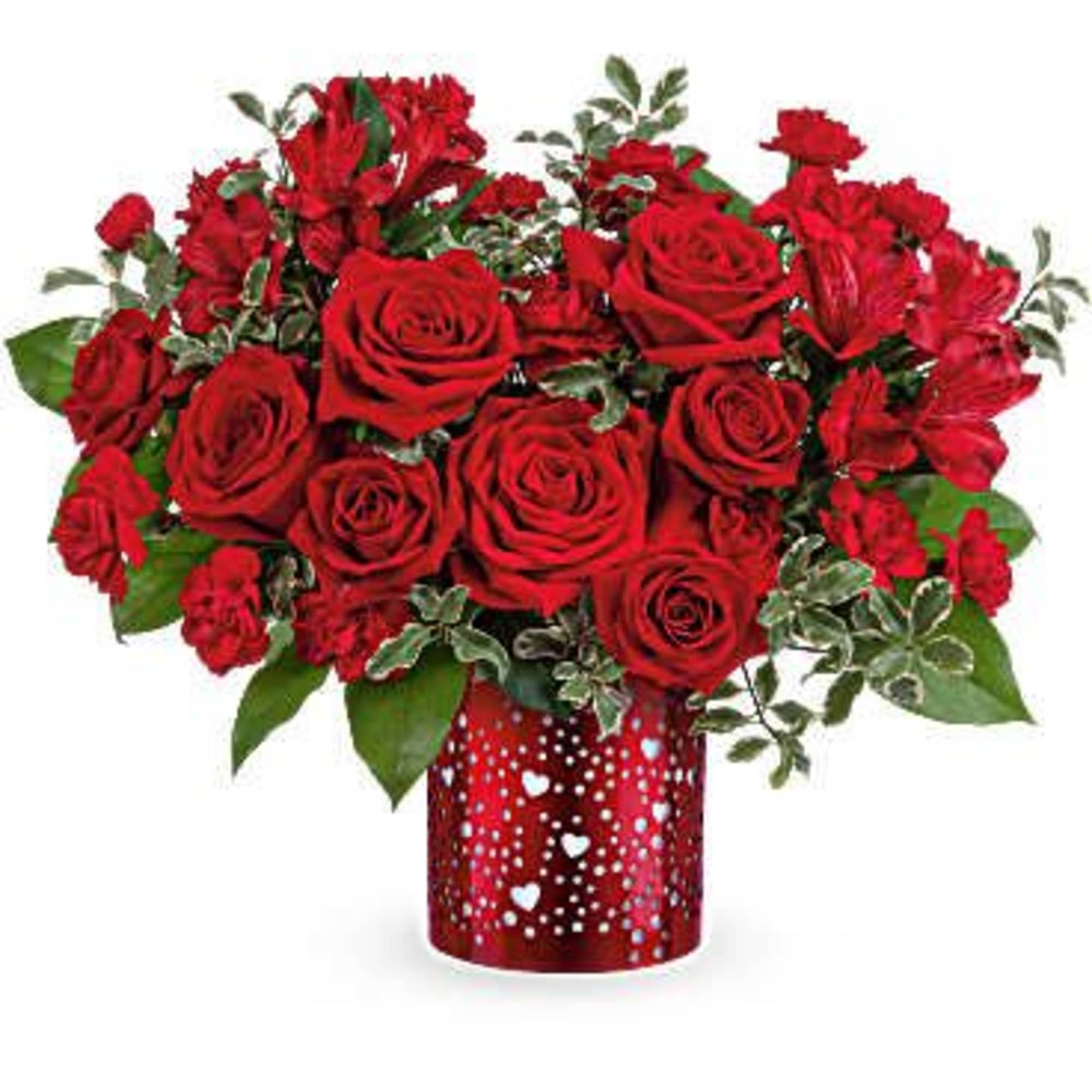 Red roses and carnations in a heart-patterned vase