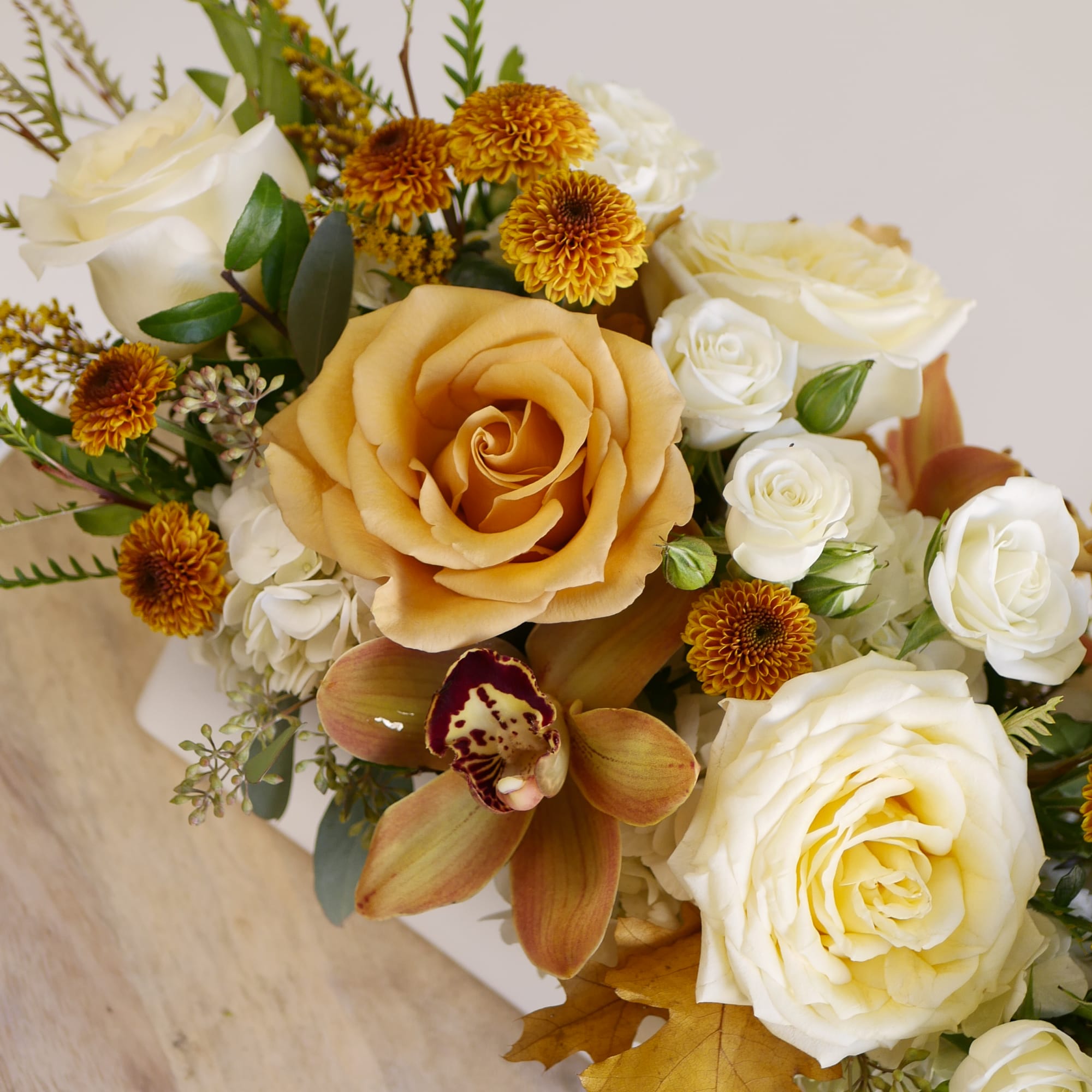 Arrangement approximately measures 8 inches tall and 18 inches long with flowers.

Celebrate, photo 2 of 4
