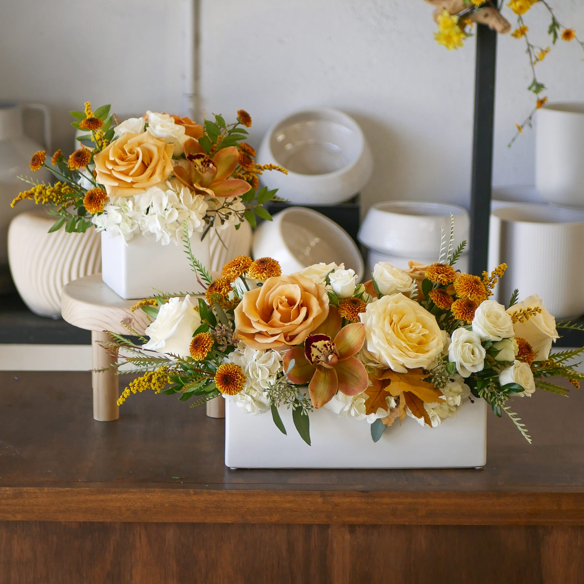 This petite Thanksgiving flower arrangement features soft cream roses and vibrant golden, photo 3 of 3