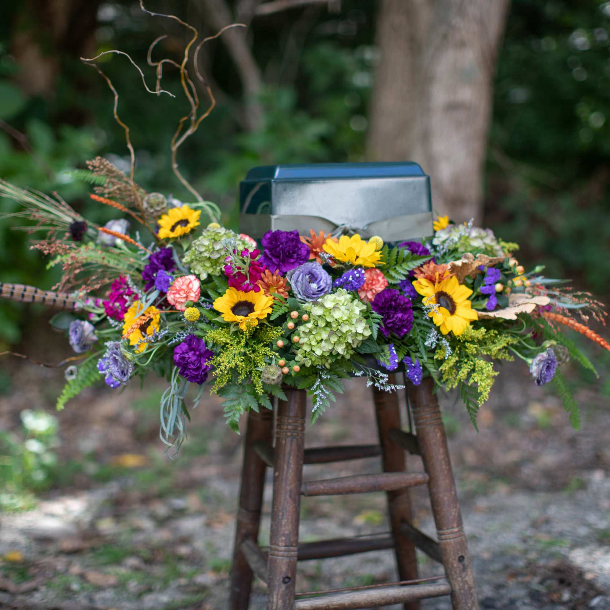 Seasonal funeral flowers are always a beautiful choice. Fall blooms usually include, photo 3 of 3