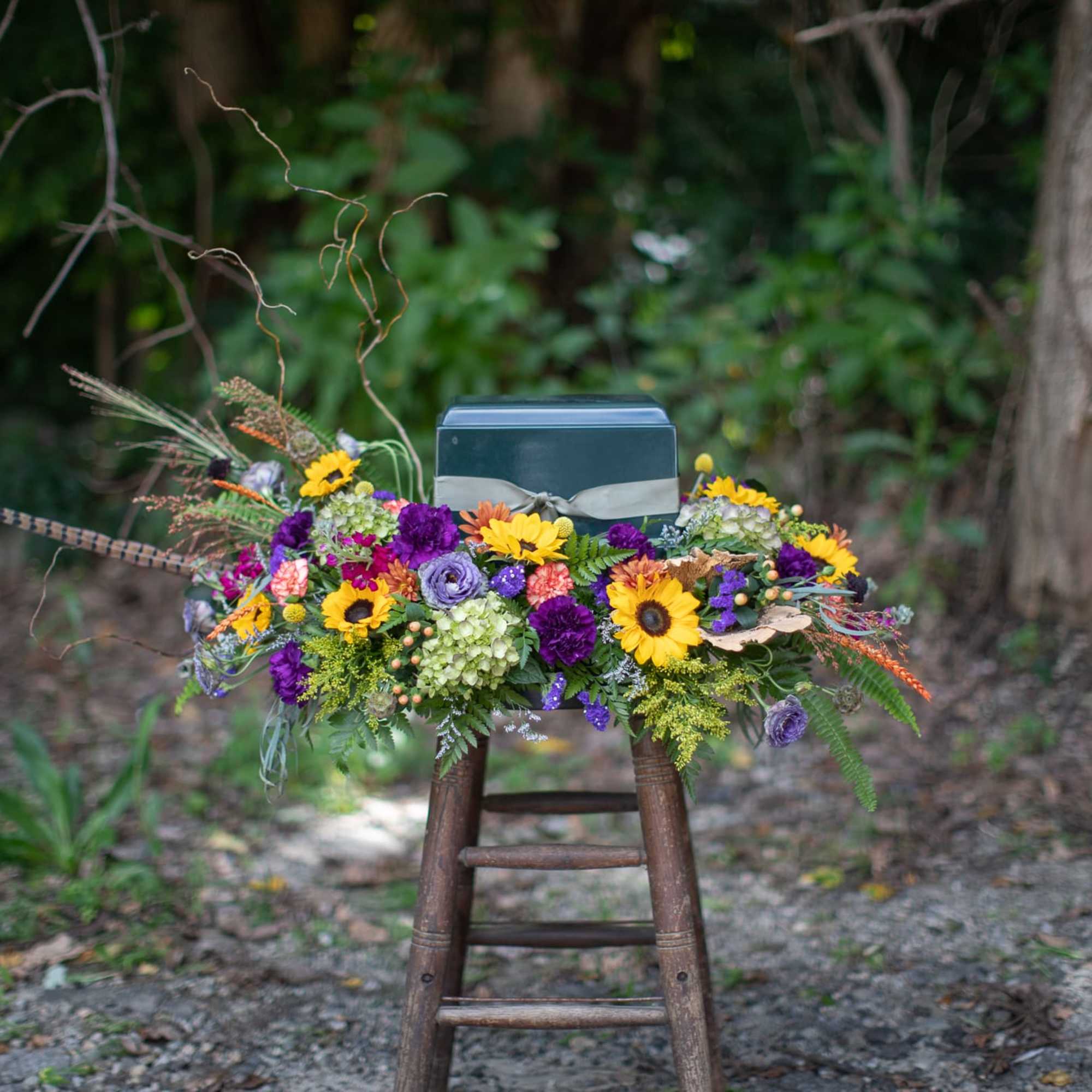 Seasonal funeral flowers are always a beautiful choice. Fall blooms usually include