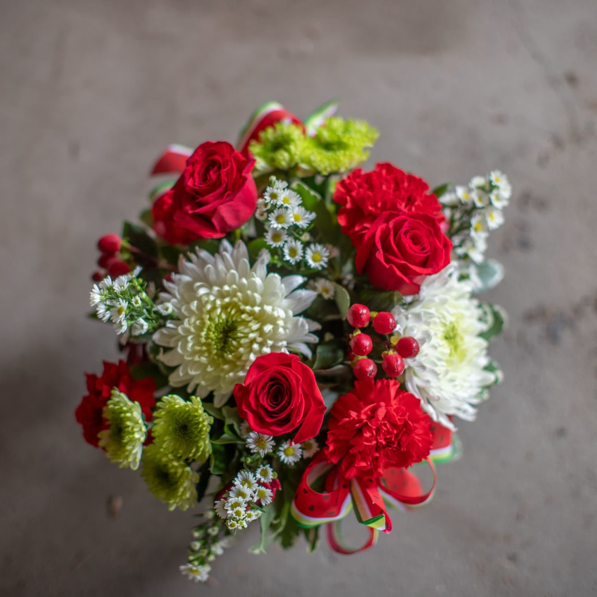 A fresh design of roses, cremons, carnations and button poms are arranged, photo 2 of 4