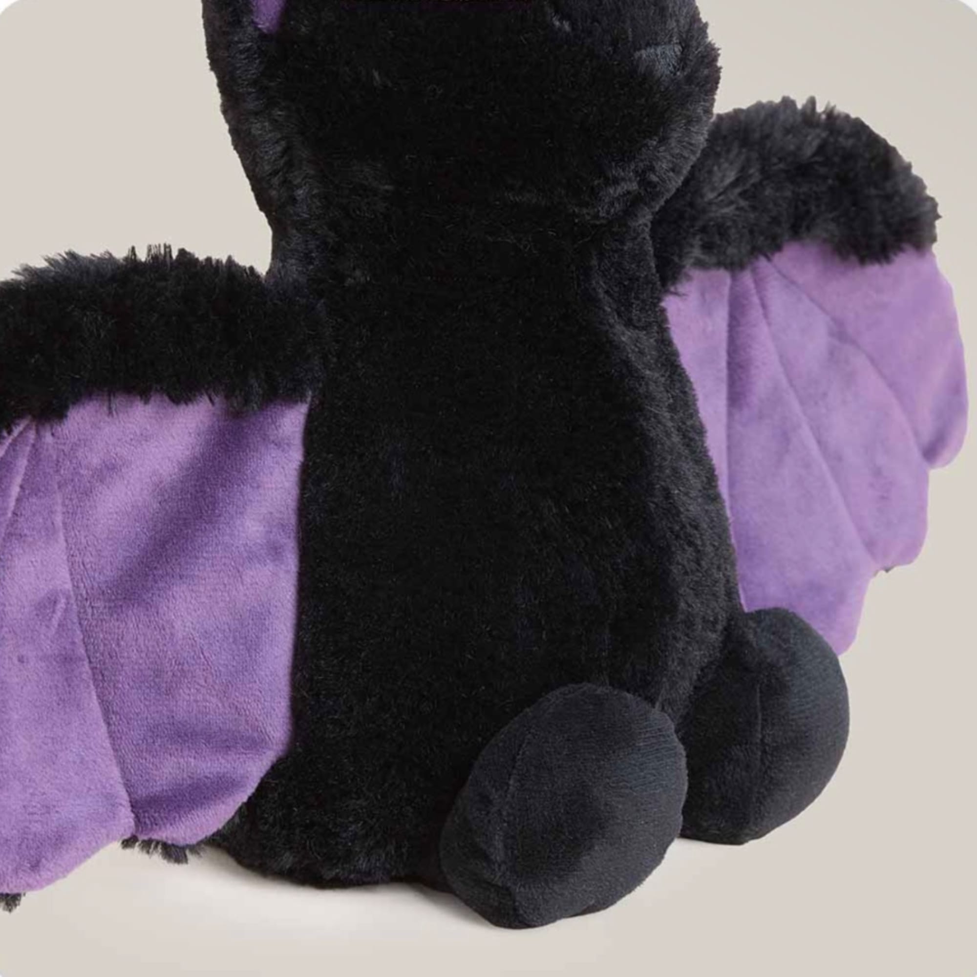 Black and purple plush bat stuffed animal