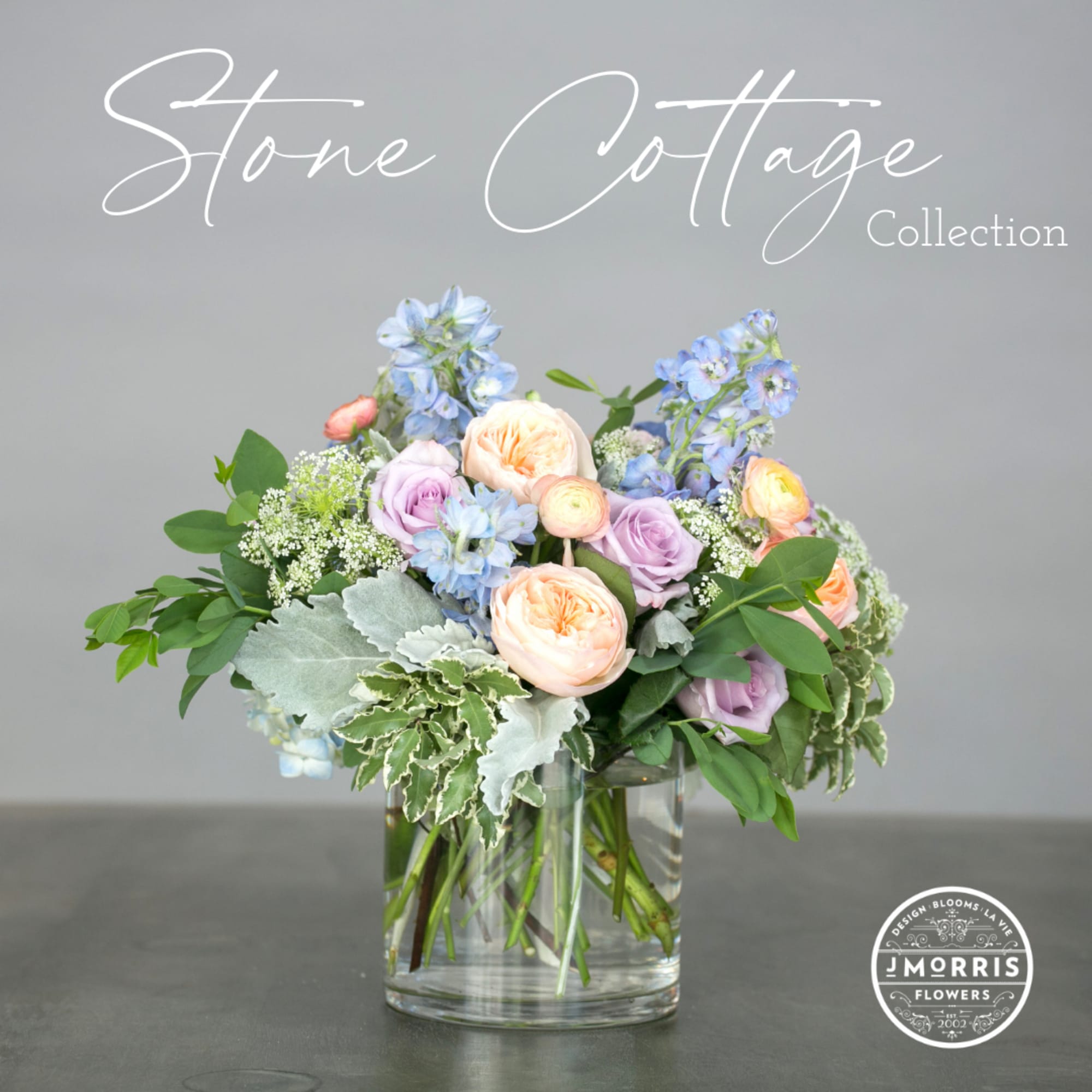 A soft gathering of blooms inspired by an English country garden. Delphinium