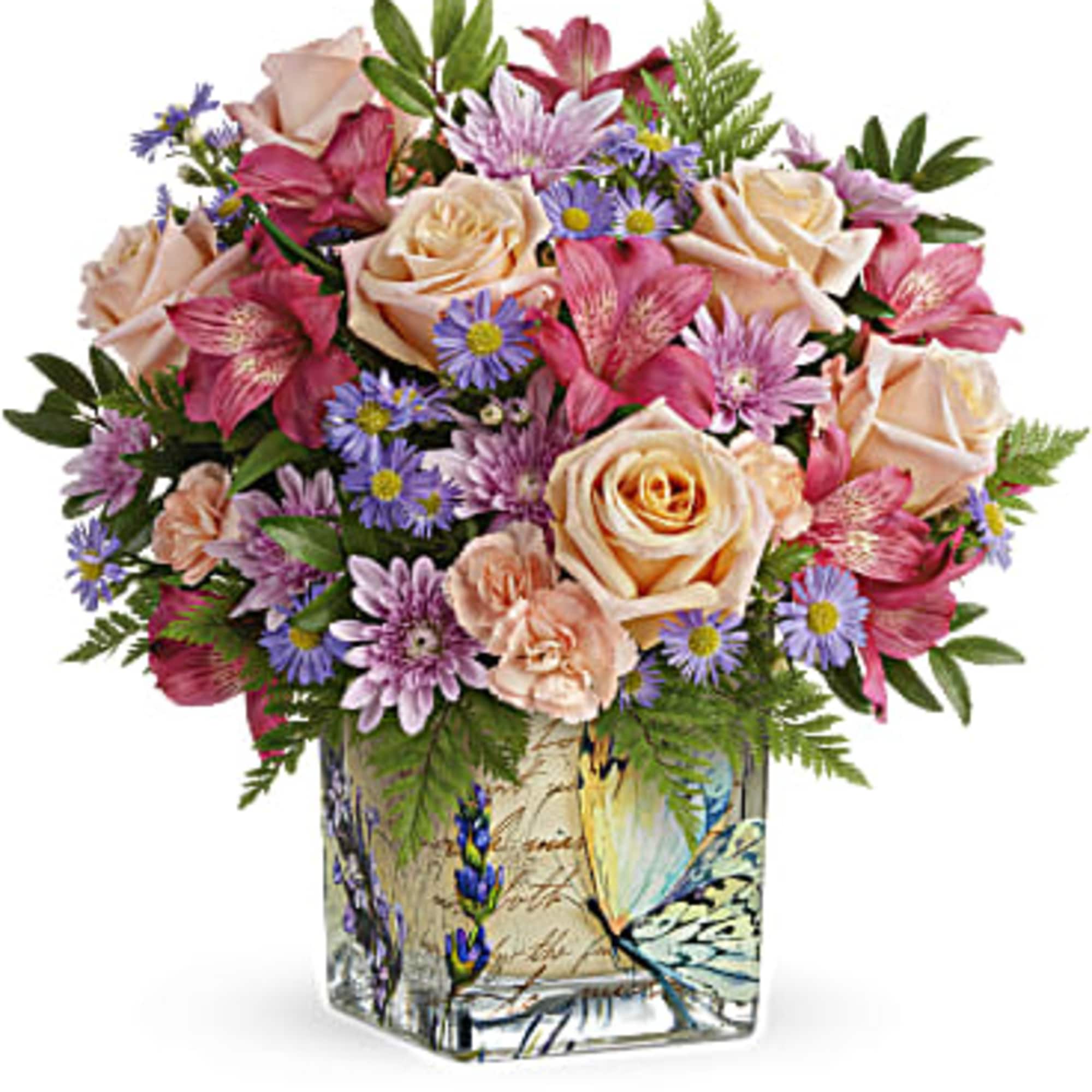 Mixed bouquet of peach roses, pink lilies, and purple daisies in a square vase