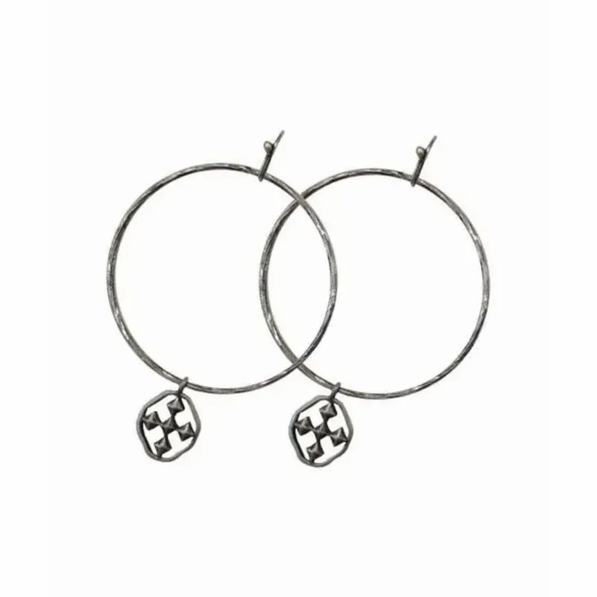 Pair of silver hoop earrings with small dangling charms