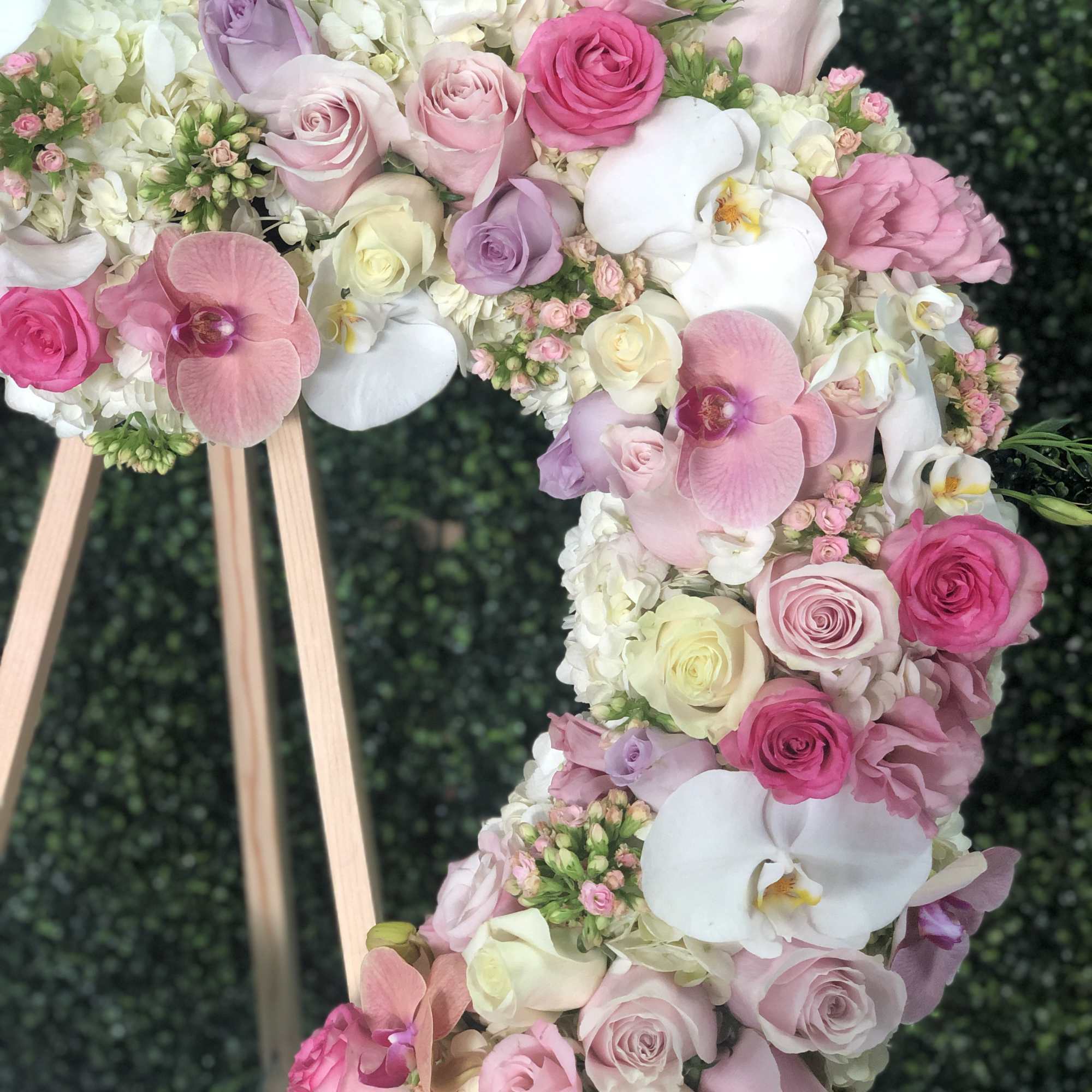 Floral number 1 covered in pink, white, and lavender blooms