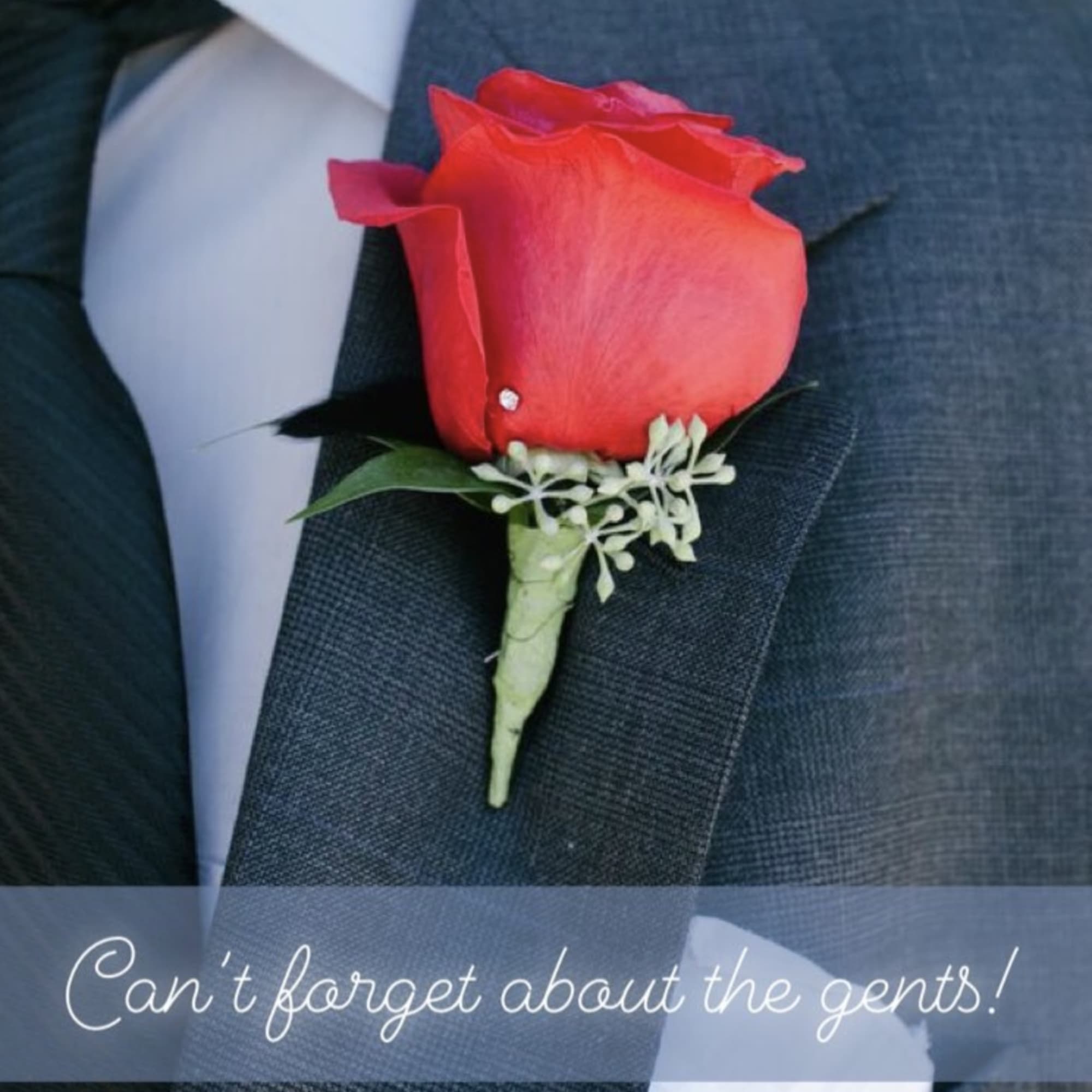 Red rose boutonniere pinned to a suit jacket