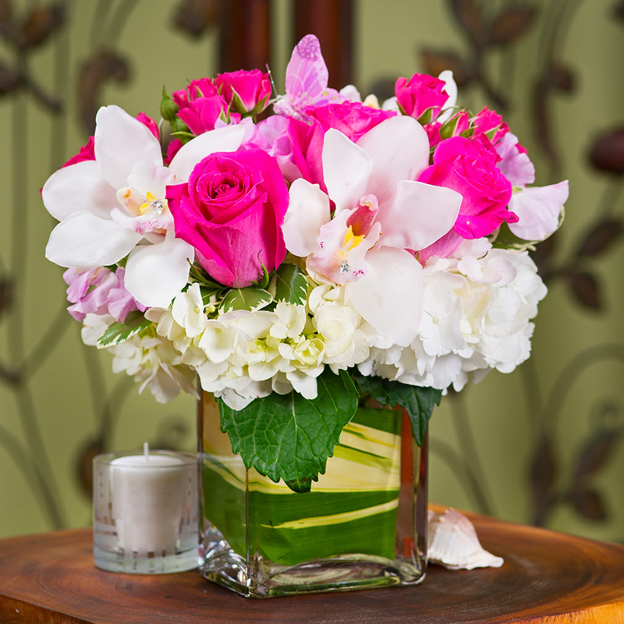 This cute pink bundle is perfect for so many occasions!
Roses, cymbidium Orchids, photo 2 of 2