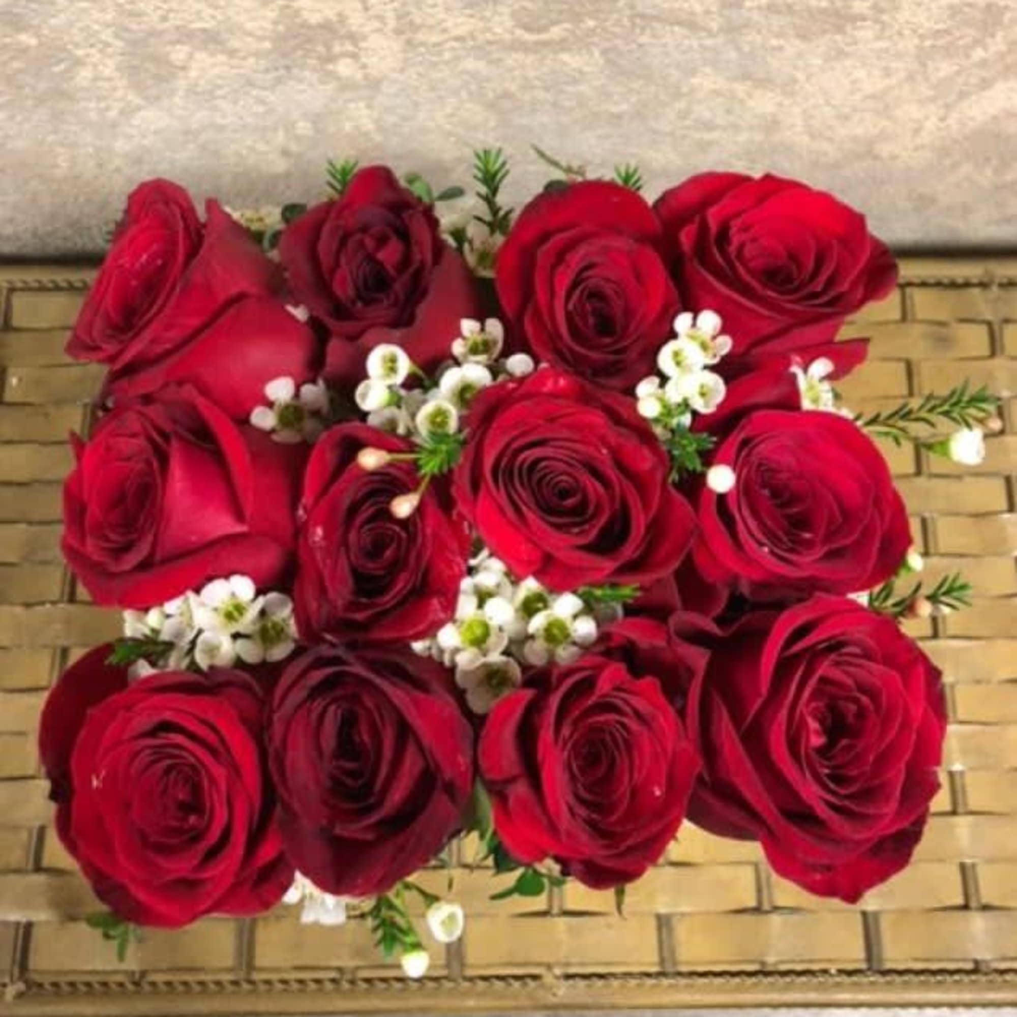 Type of Flowers: Red Roses and filler in a handmade, reusable, wooden, photo 3 of 3