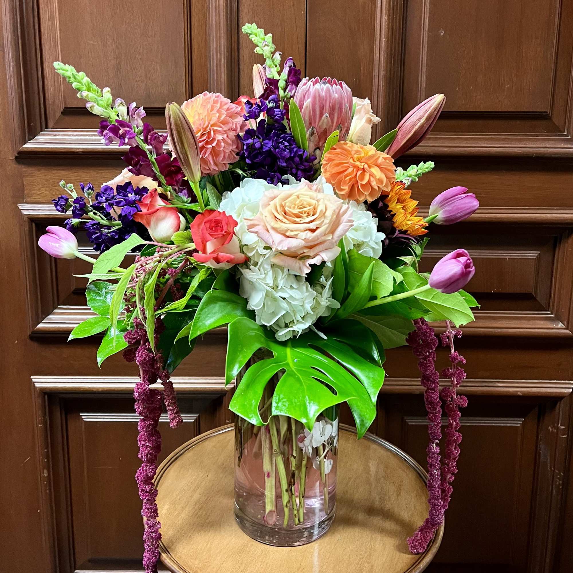 Recipe: Yellow Seasonal Dahlias Red/Orange Lilies, Red/Orange Sunflower, Pink Snapdragons, Orange Roses