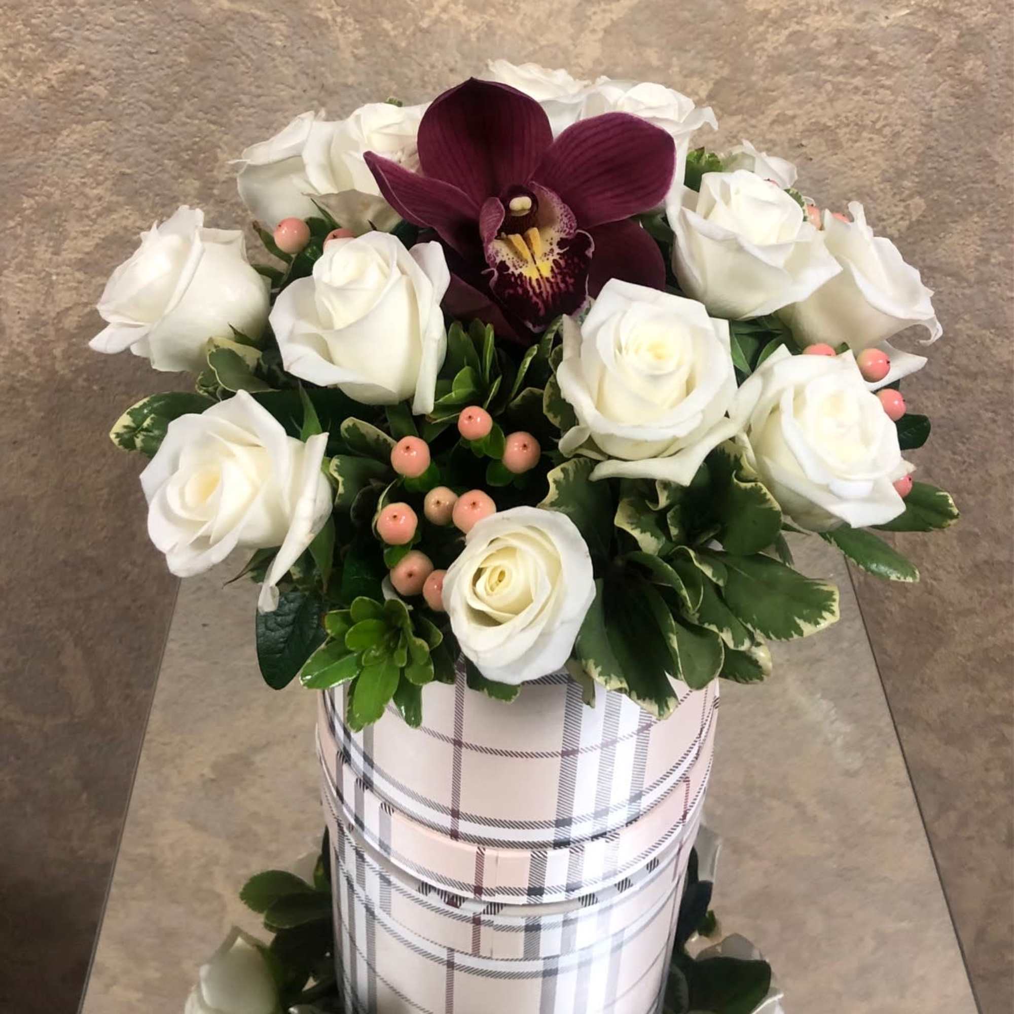 Recipe: White roses, burgundy orchid, and berries in a beautiful black plaid