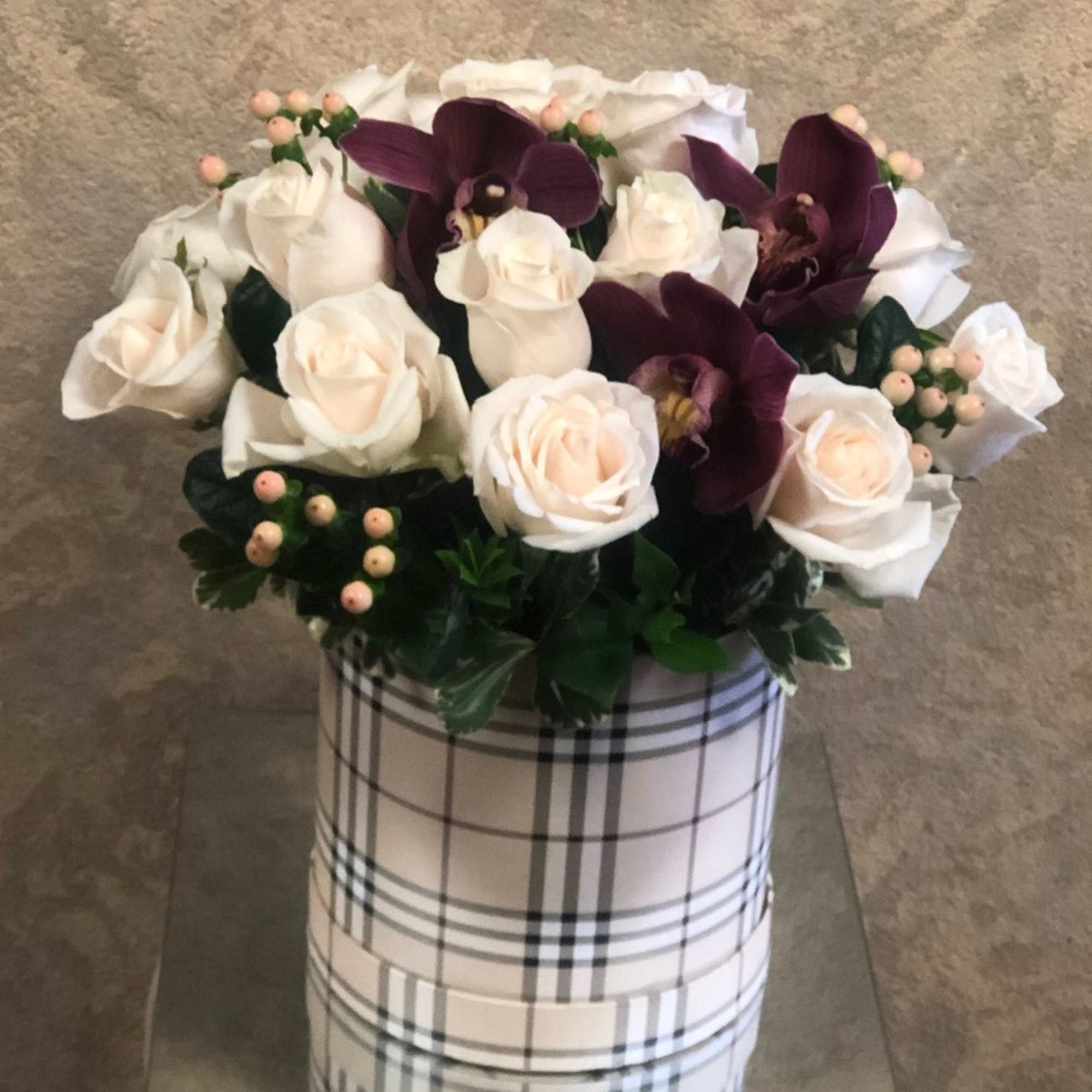 Recipe: White roses, burgundy orchid, and berries in a beautiful black plaid, photo 2 of 3