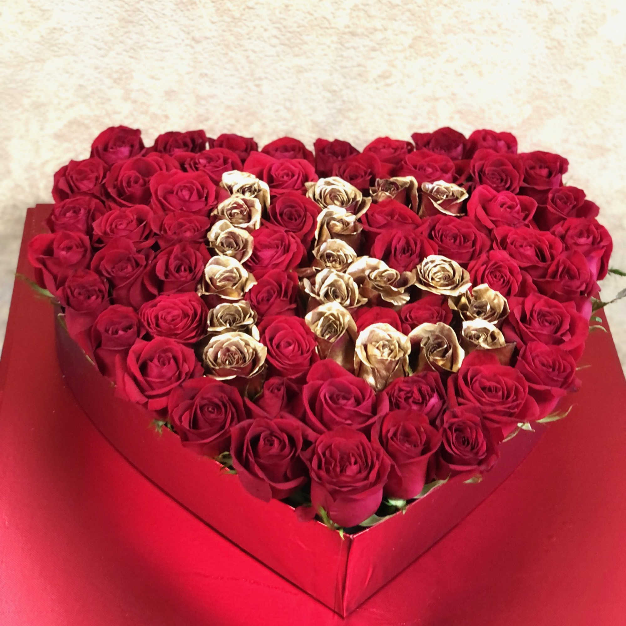ANNIVERSARY or BIRTHDAY Heart-shaped covered box with 60-75 roses.  Roses can