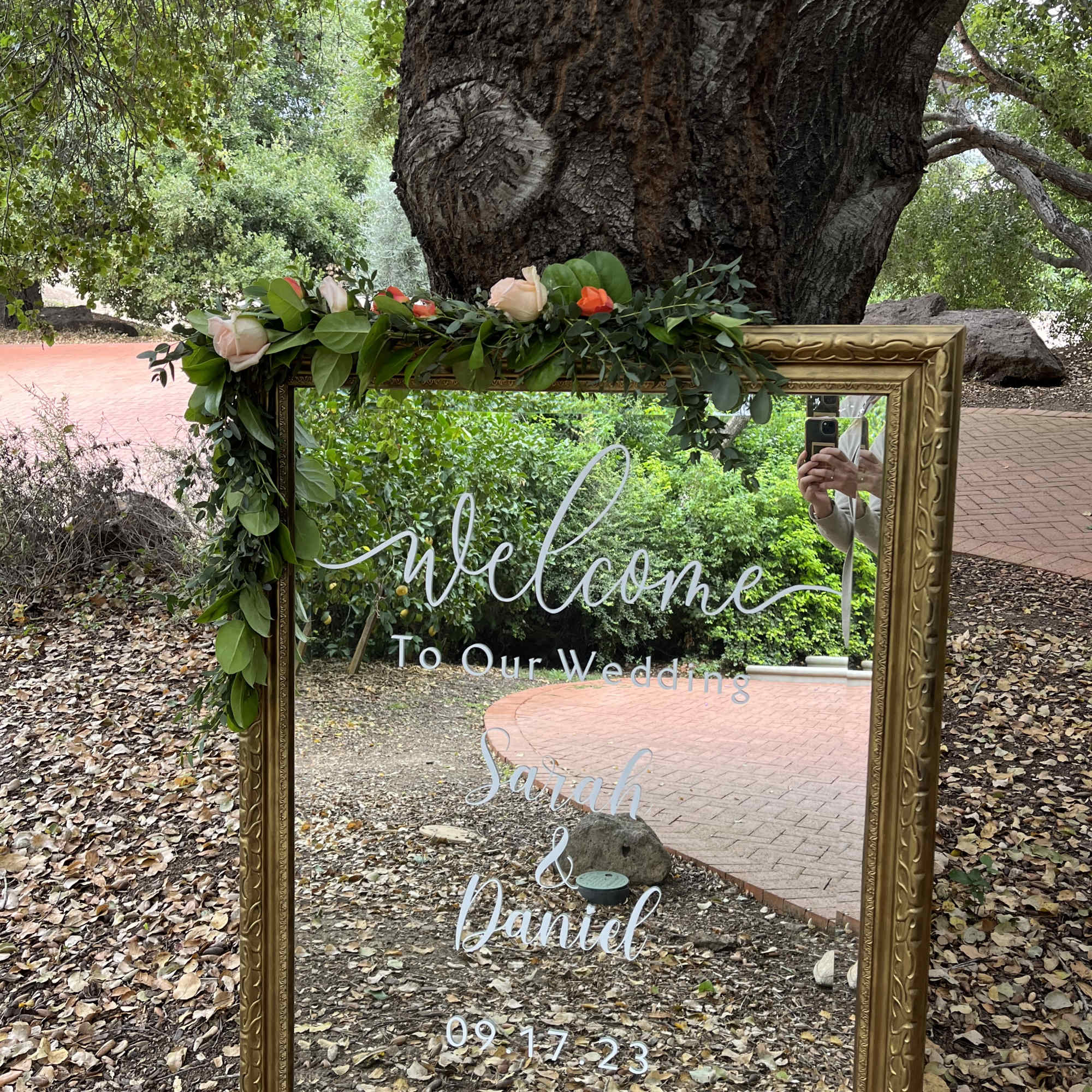 Easel, Fresh Green Garland, and Mirror Package Rental
Flowers for garland will be