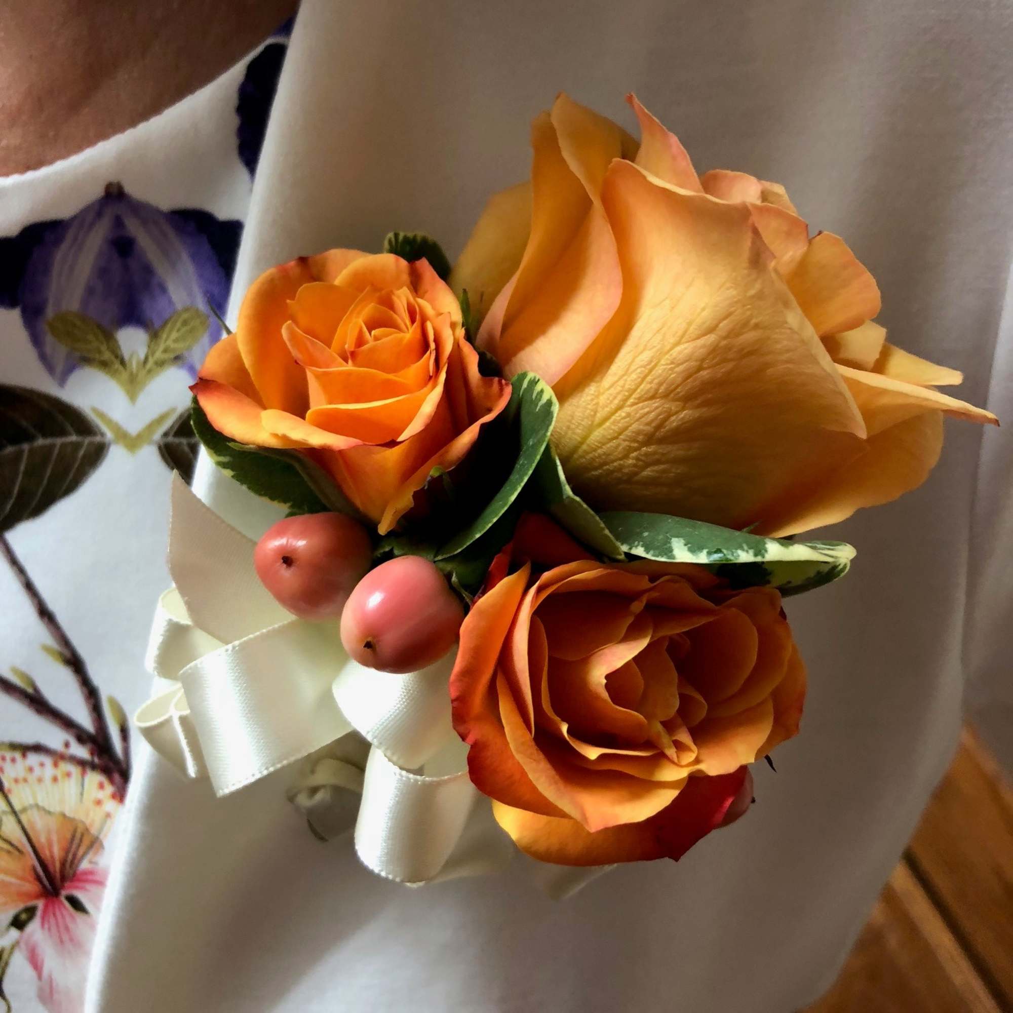 Recipe: Rose, Spray roses, and hypericum berries with choice of ribbon corsage
