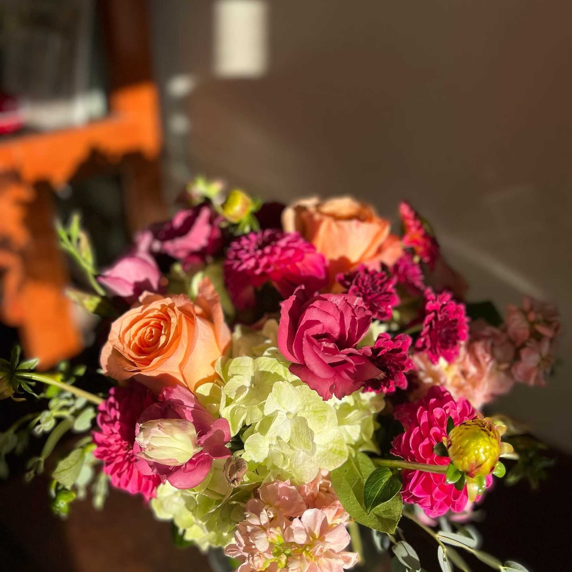 This arrangement includes Seasonal Pink Dahlias, Beautiful Magenta Lisianthus, Green Hydrangeas, Pale, photo 2 of 3